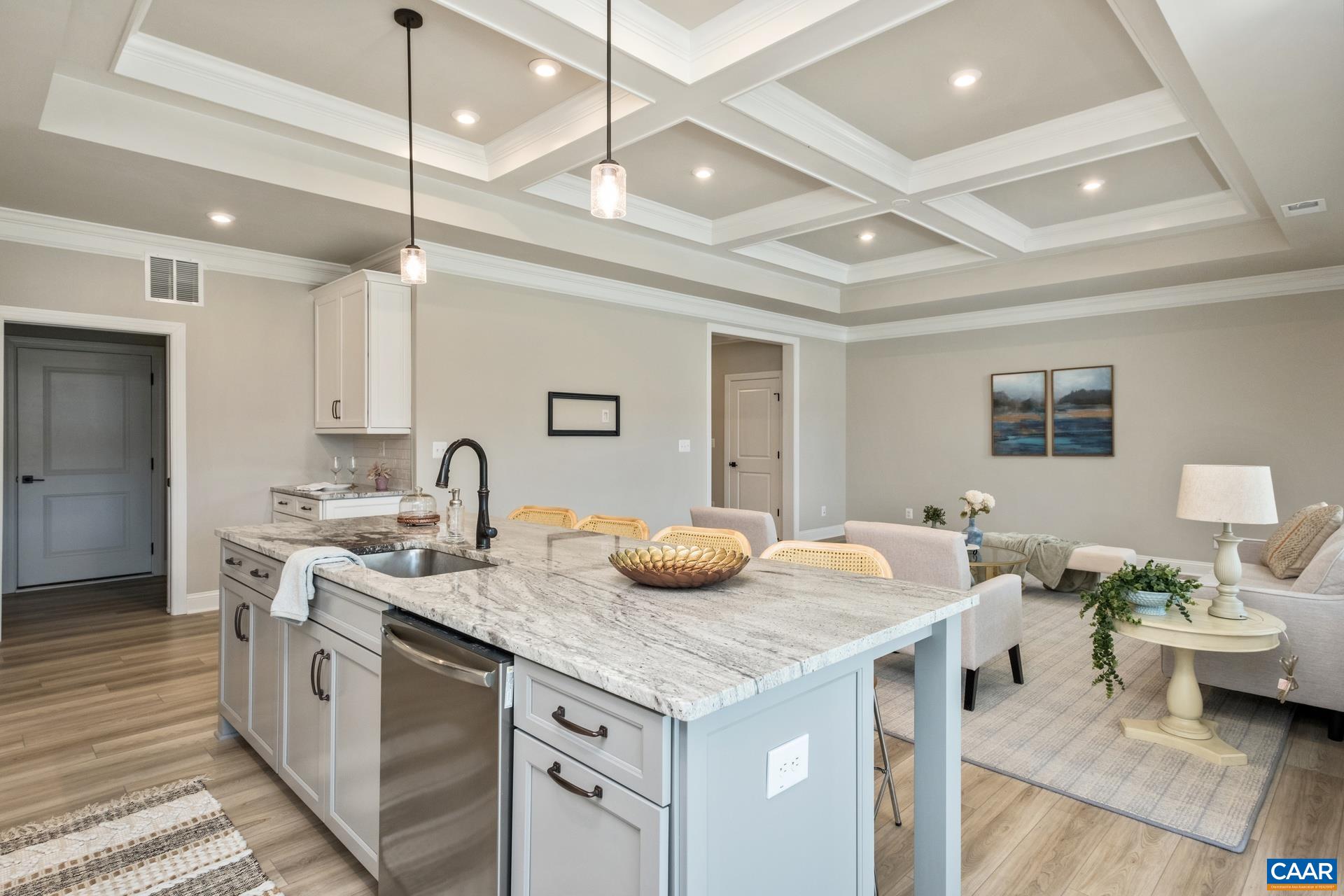 The island cabinetry color is stone.  The island features plenty of seating and electric outlets.
