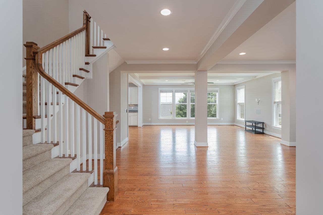 9 FT ceilings, extensive trim, handscraped hardwood floors and abundant natural light are just a few of the features that make this make this a standout home.