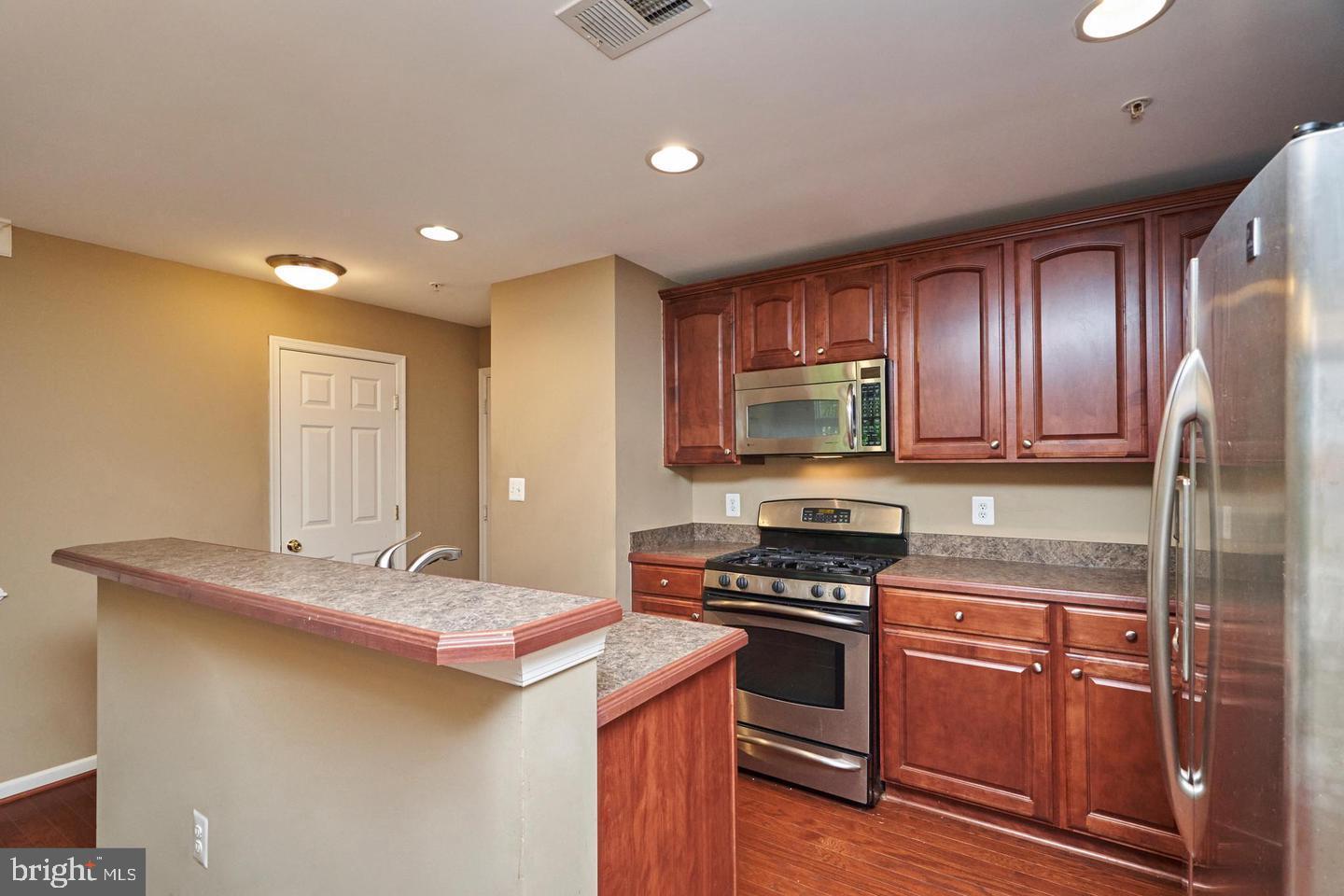 12466-A LIBERTY BRIDGE RD #103A, FAIRFAX, Virginia 22033, 2 Bedrooms Bedrooms, ,2 BathroomsBathrooms,Residential,For sale,12466-A LIBERTY BRIDGE RD #103A,VAFX2252916 MLS # VAFX2252916