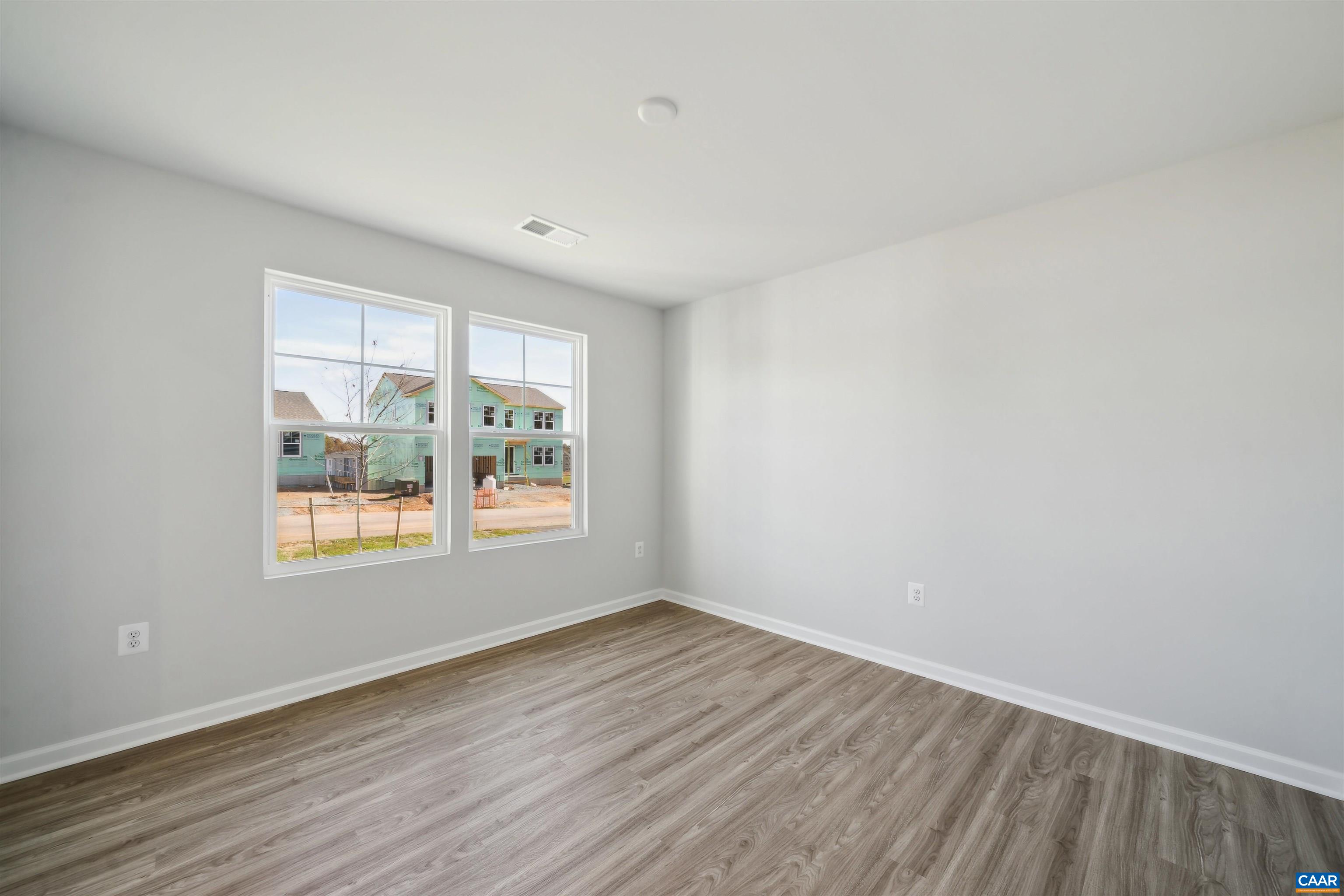 Home office or study on mail level offering LVP flooring