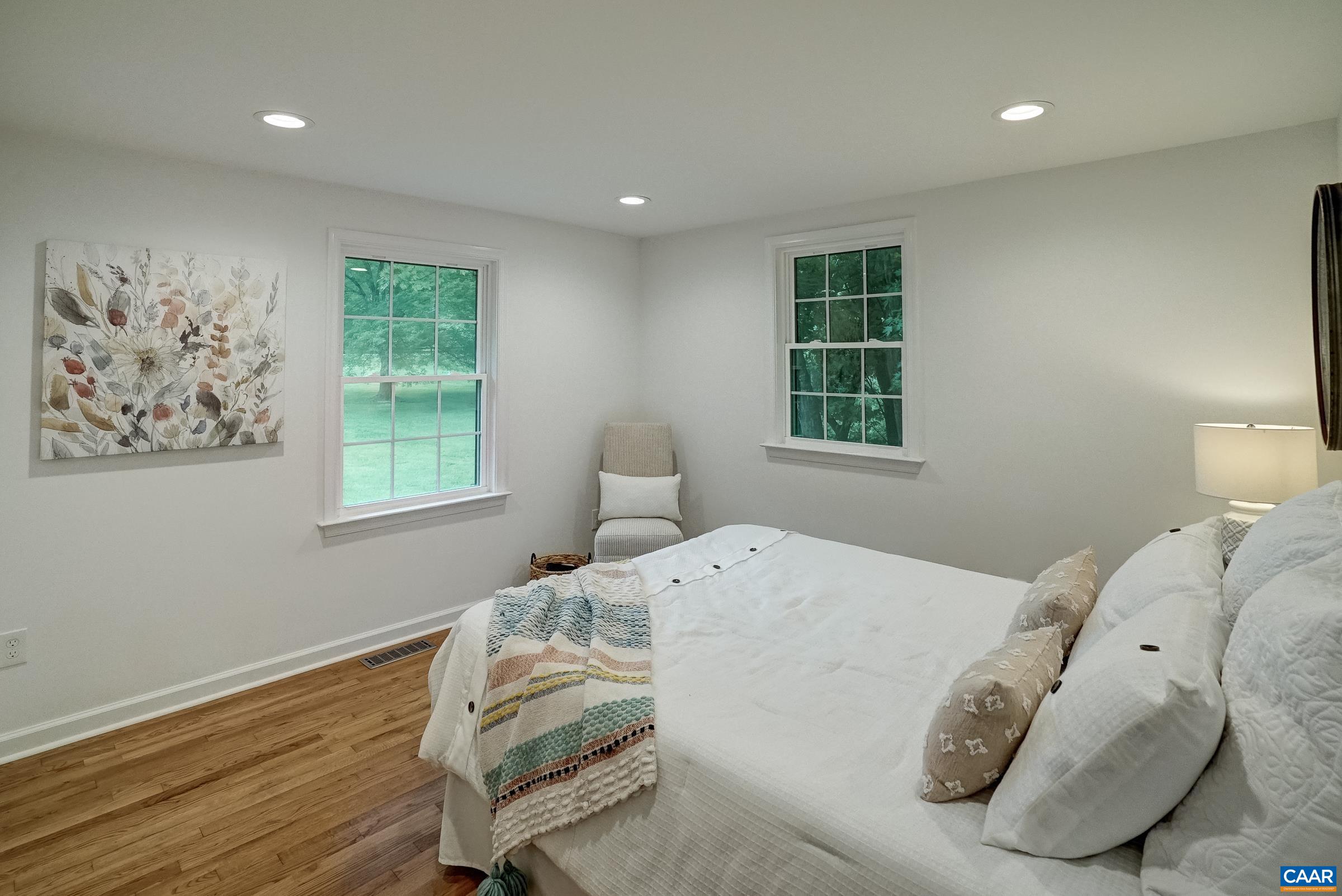 Primary bedroom on the main level with a large closet.