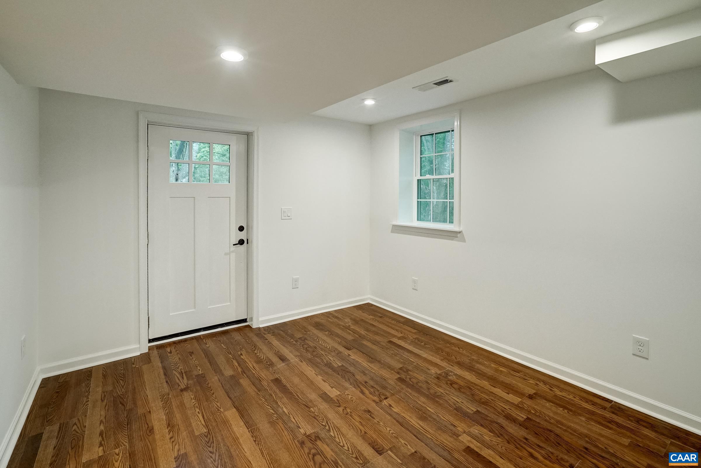 Large mudroom with access from patio.