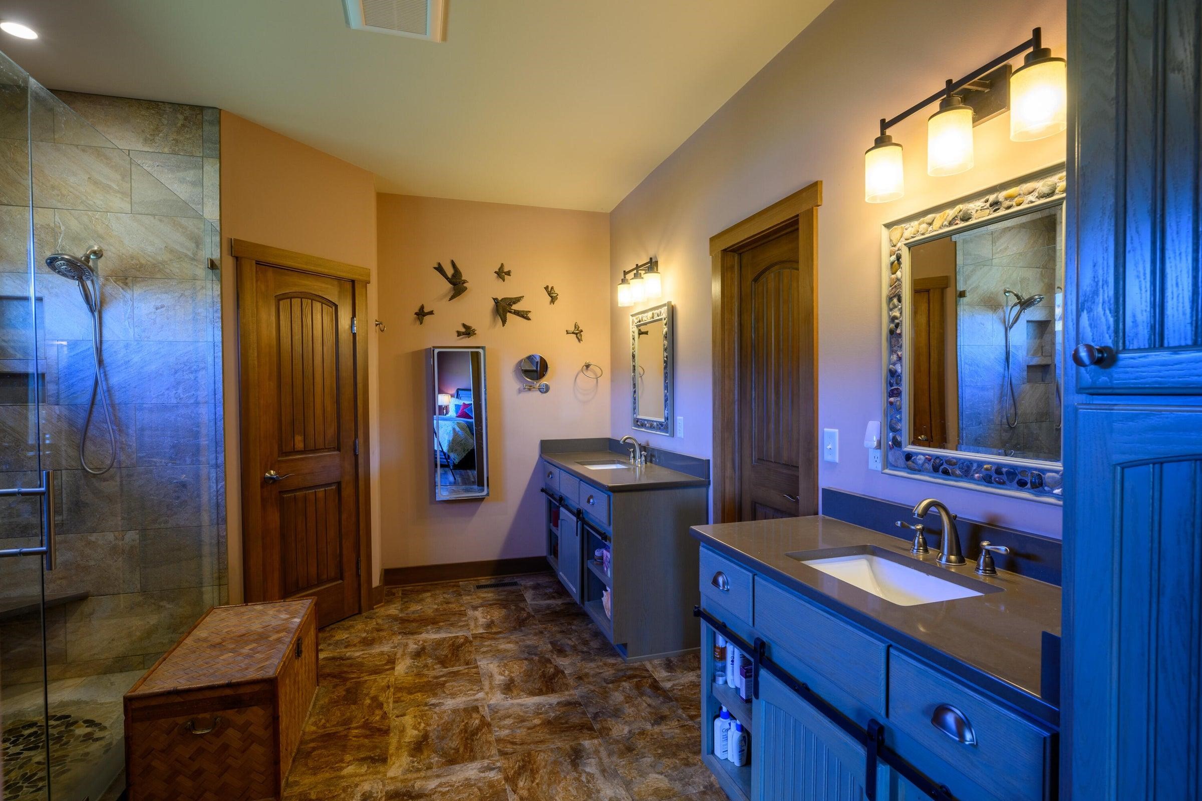 Master Bath features creative stone accents.
