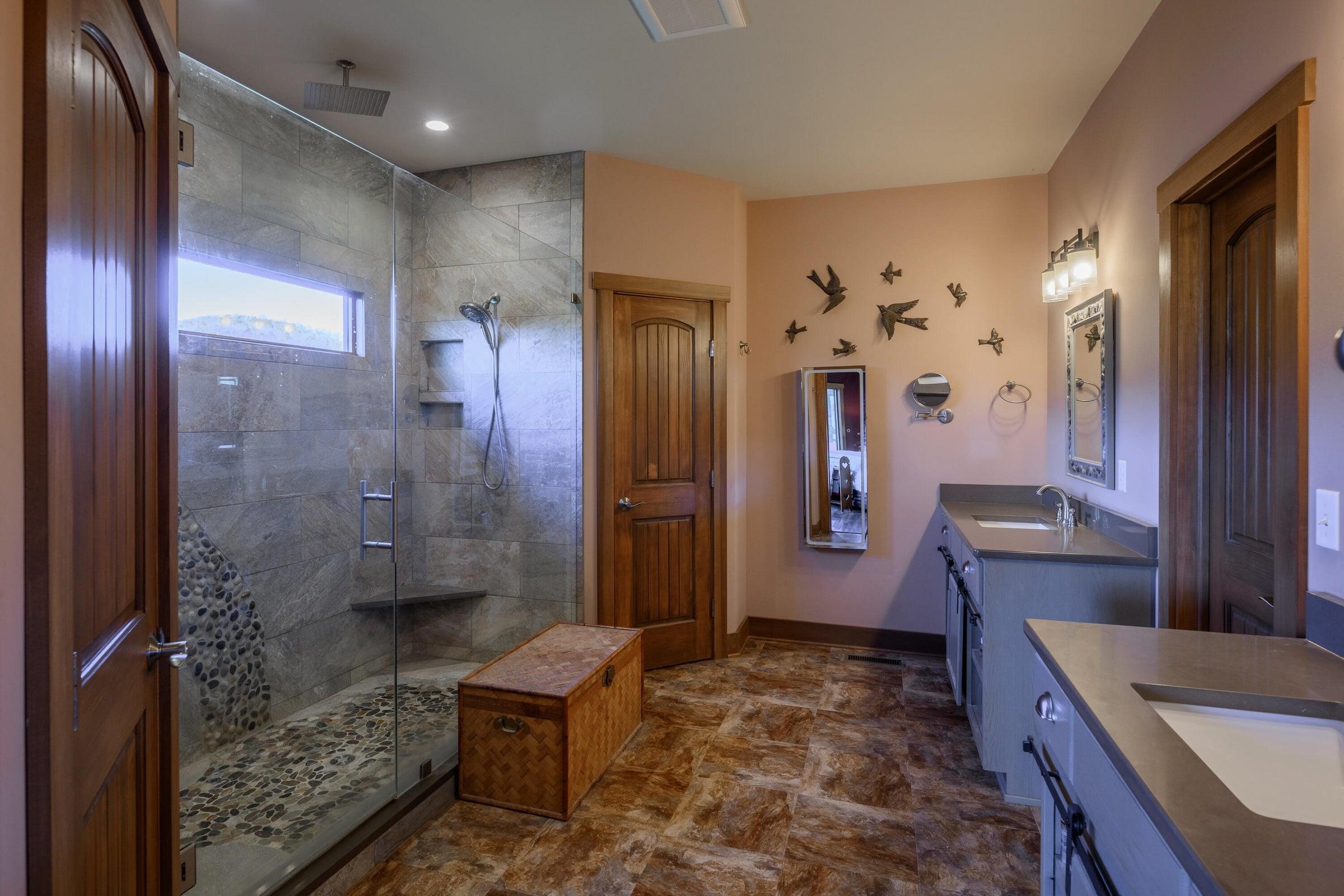 Beautiful waterfall stonework in the walk-in shower.