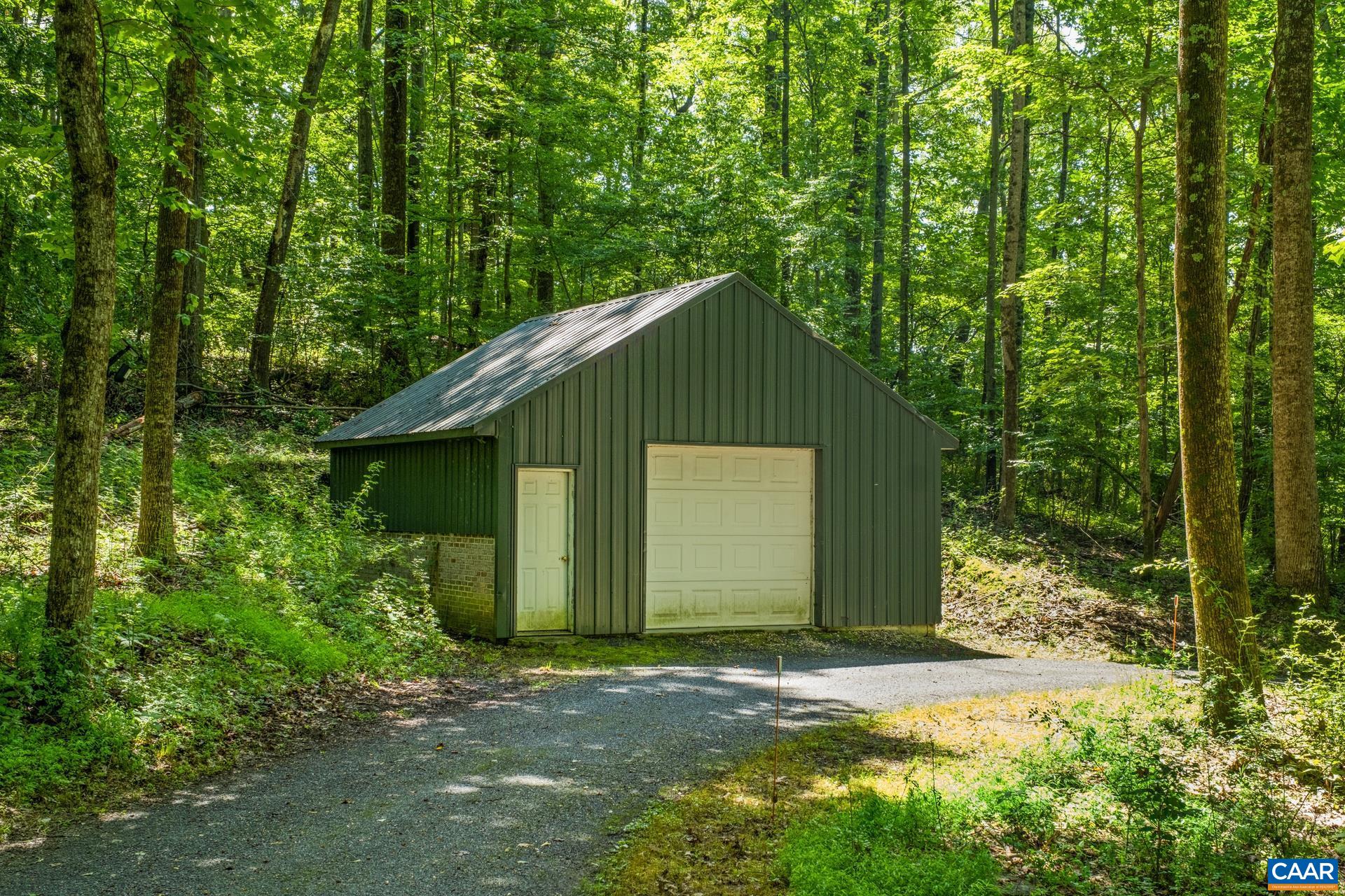 A third garage is located along the driveway.  Great for farm equipment and storage.