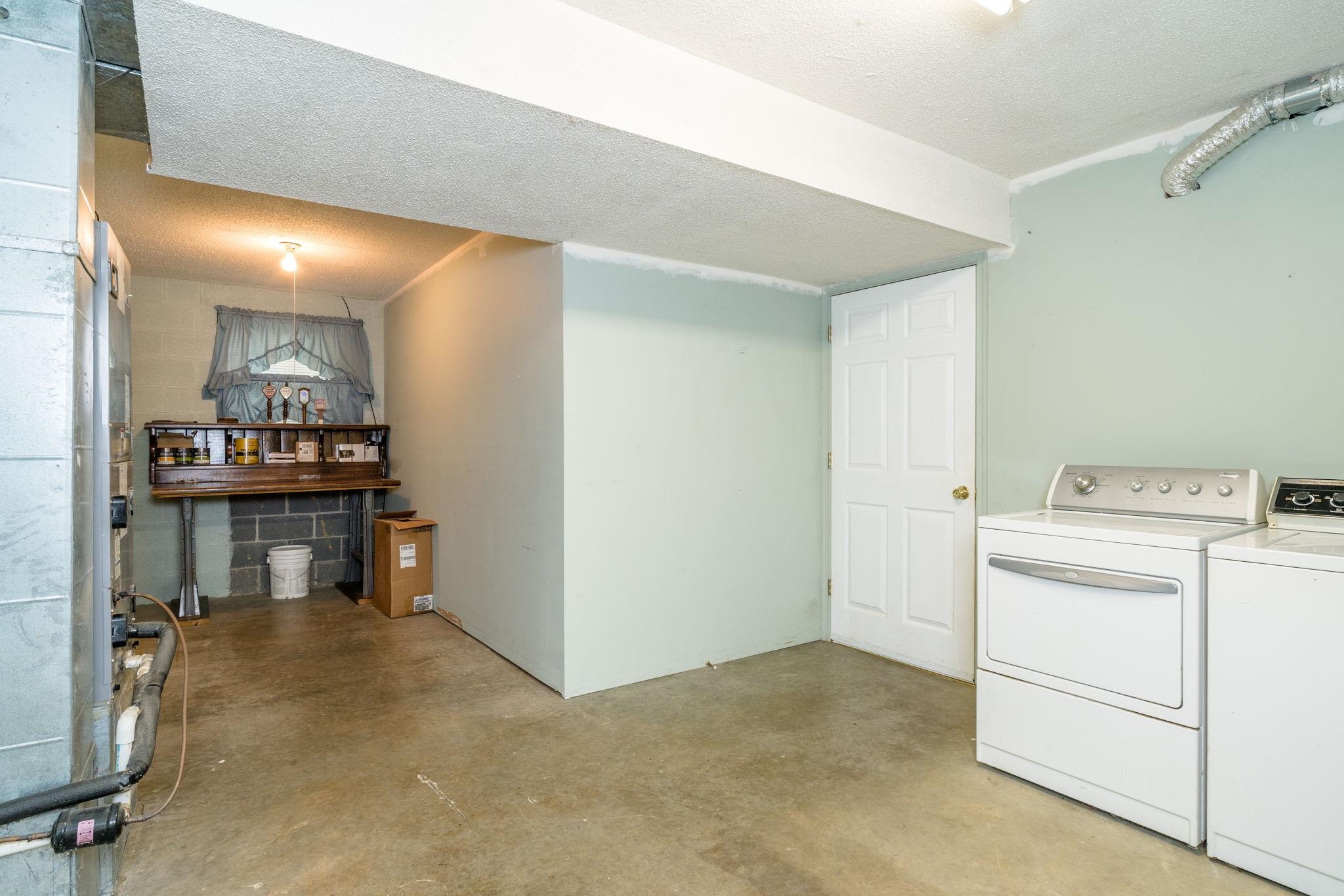 lower level. washer & dryer working, convey as is