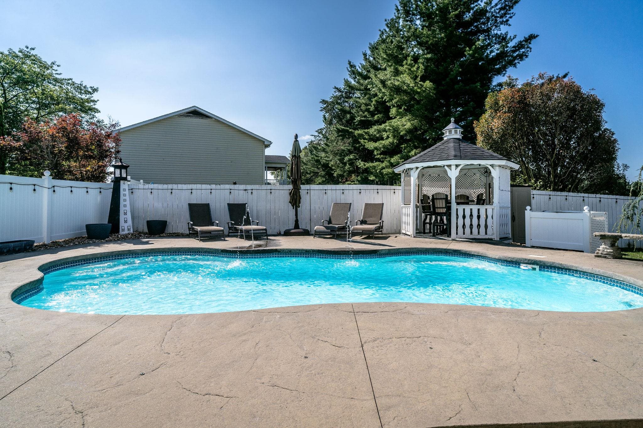 Smooth stamped concrete around pool
