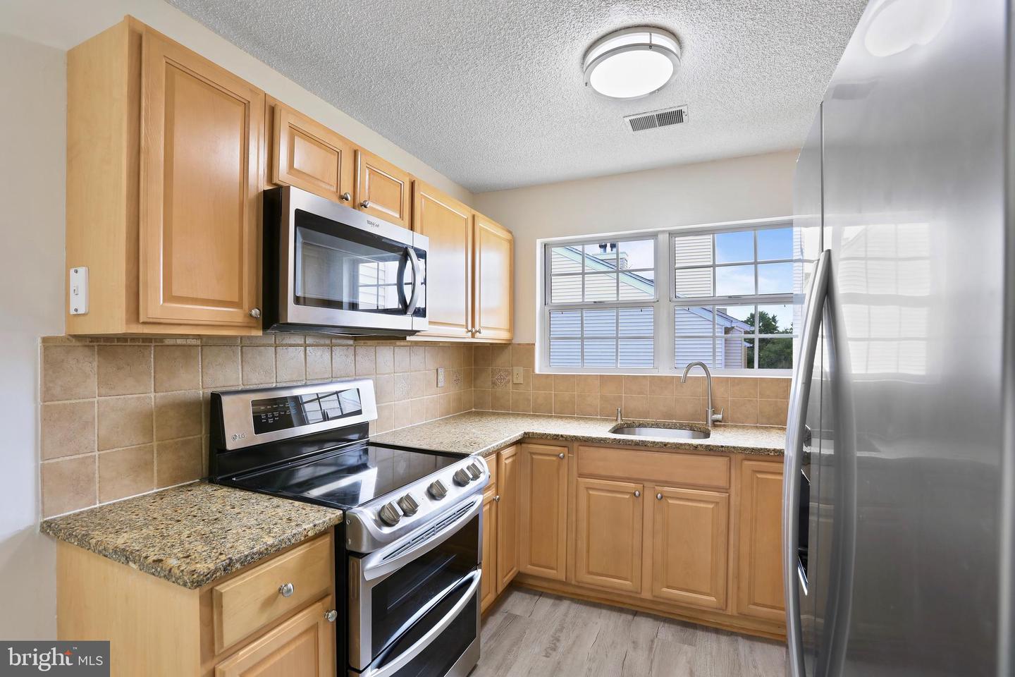 1117 HUNTMASTER TER NE #302, LEESBURG, Virginia 20176, 2 Bedrooms Bedrooms, ,2 BathroomsBathrooms,Residential,For sale,1117 HUNTMASTER TER NE #302,VALO2095962 MLS # VALO2095962