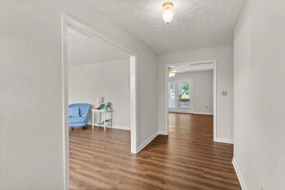 with living room to the left and den straight ahead.