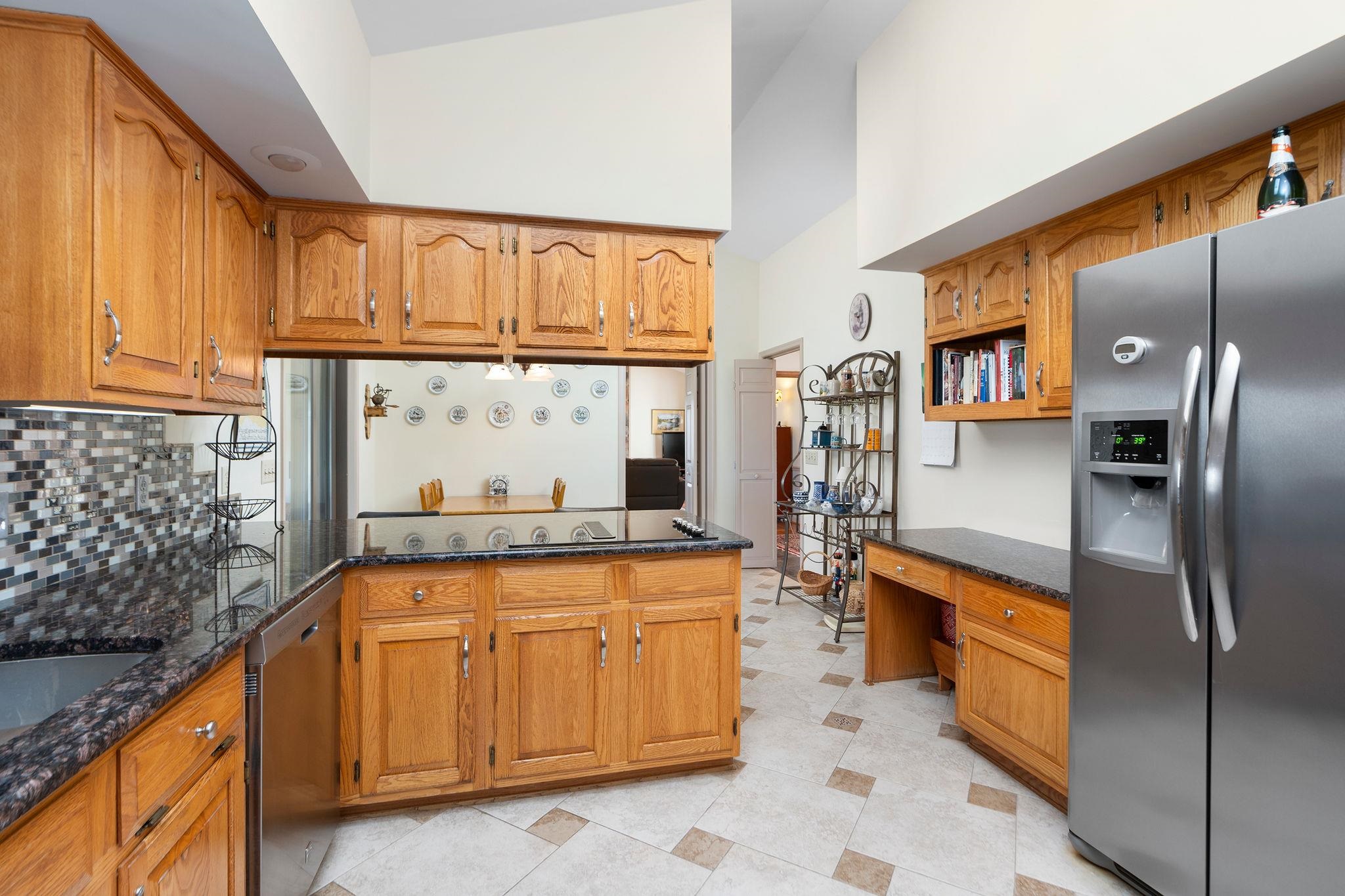 Wood Cabinets, Stainless Appliances, Ceramic Tile Floor
