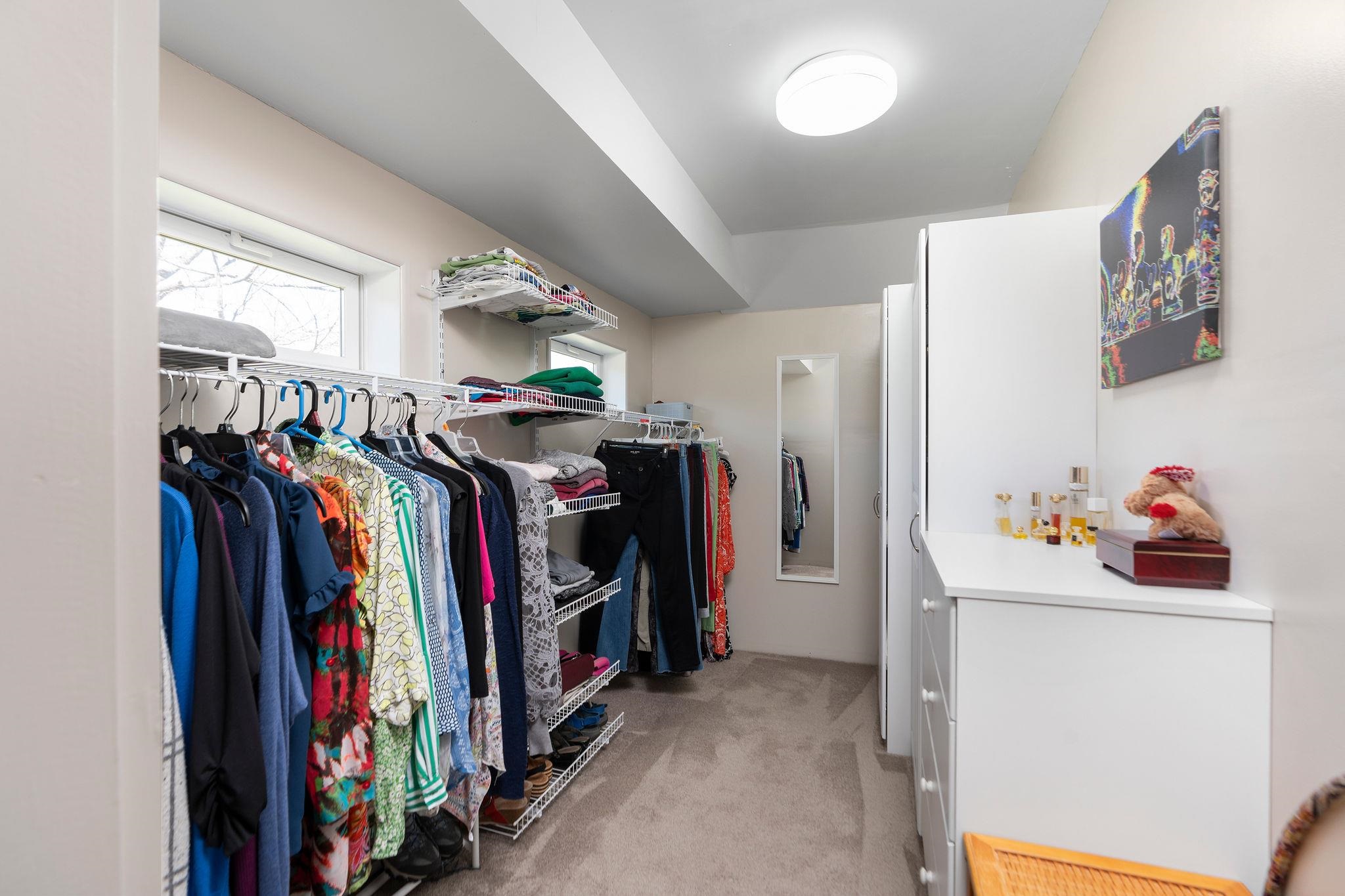 One of two walk-in closets in the Primary Suite.