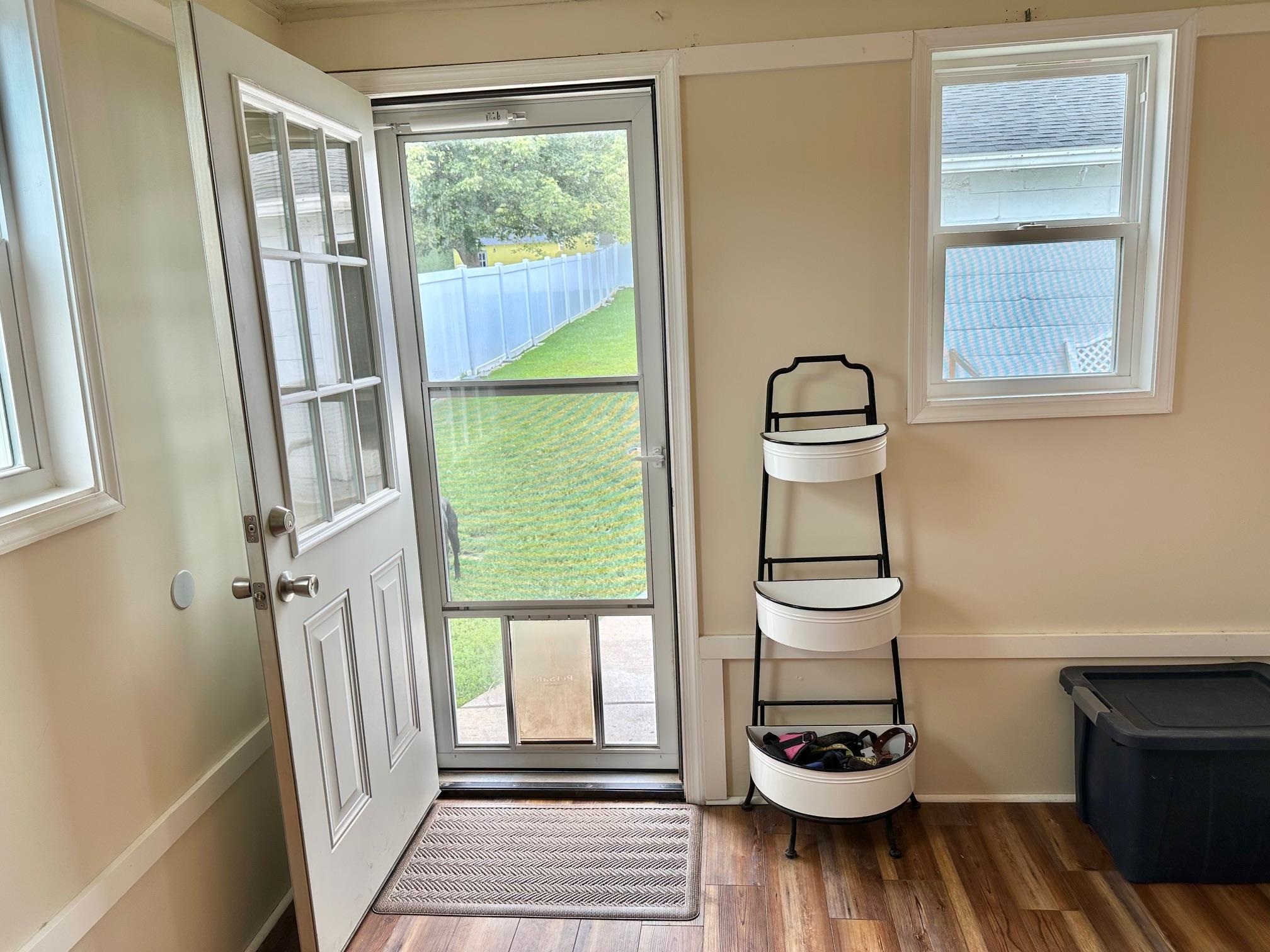 off the kitchen, with a pantry and dog room