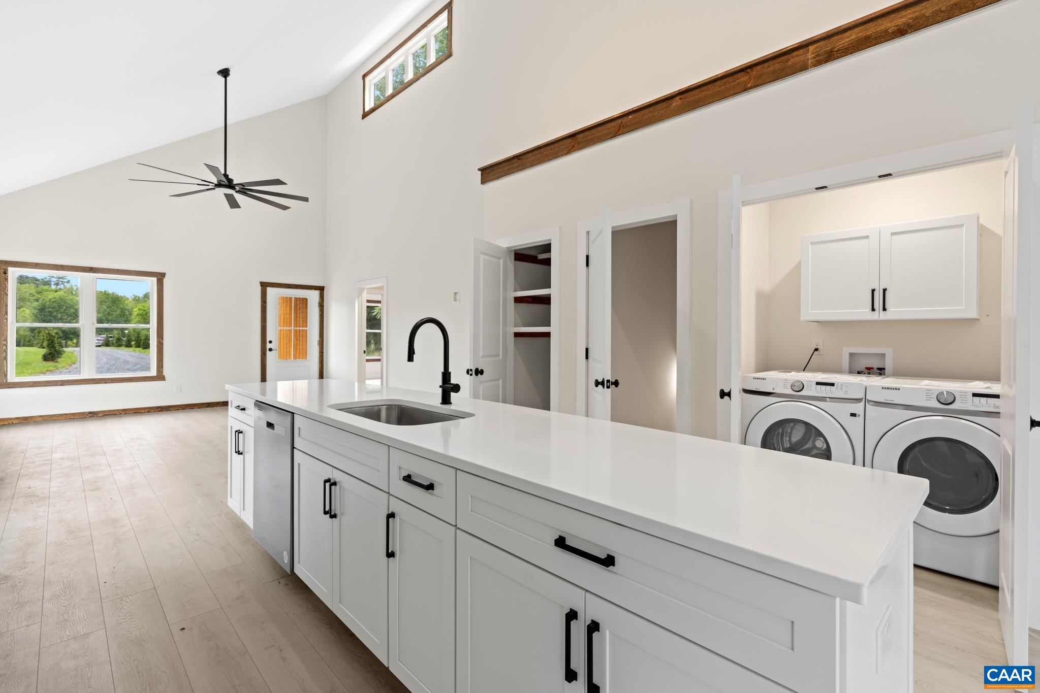Expansive and striking, topped with gleaming quartz that catches the light. It is more then functional it is a statement, offering room for everything from morning coffee to celebrations with family and friends.