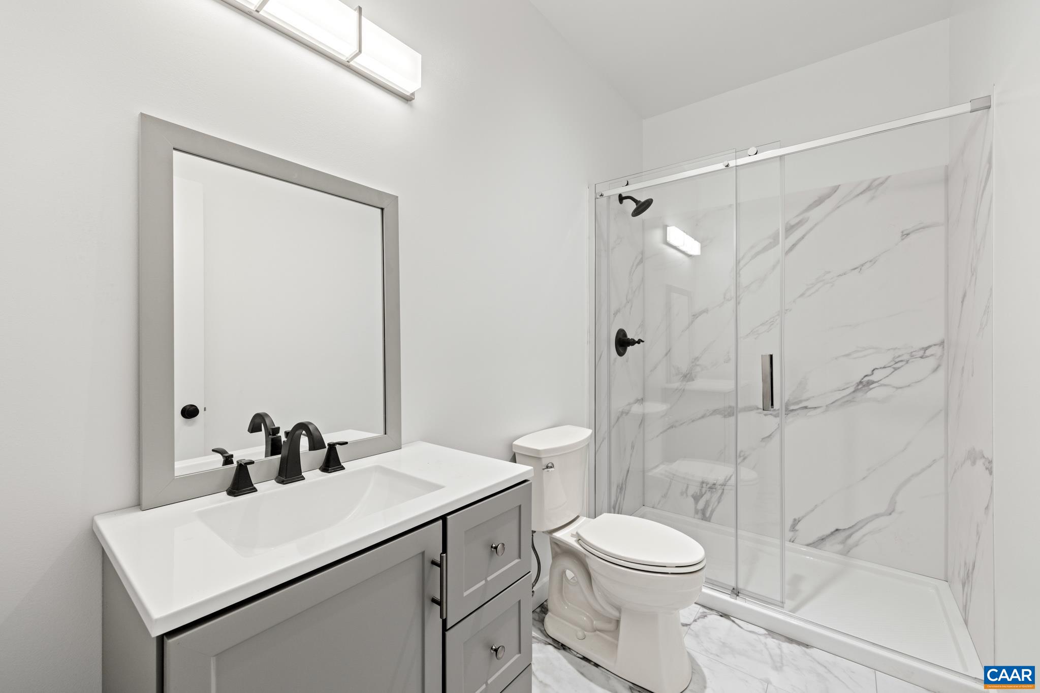 The Jack and Jill bathroom features dual access doors connecting 2 bedroom. Perfectly designed for shared use without sacrificing privacy.