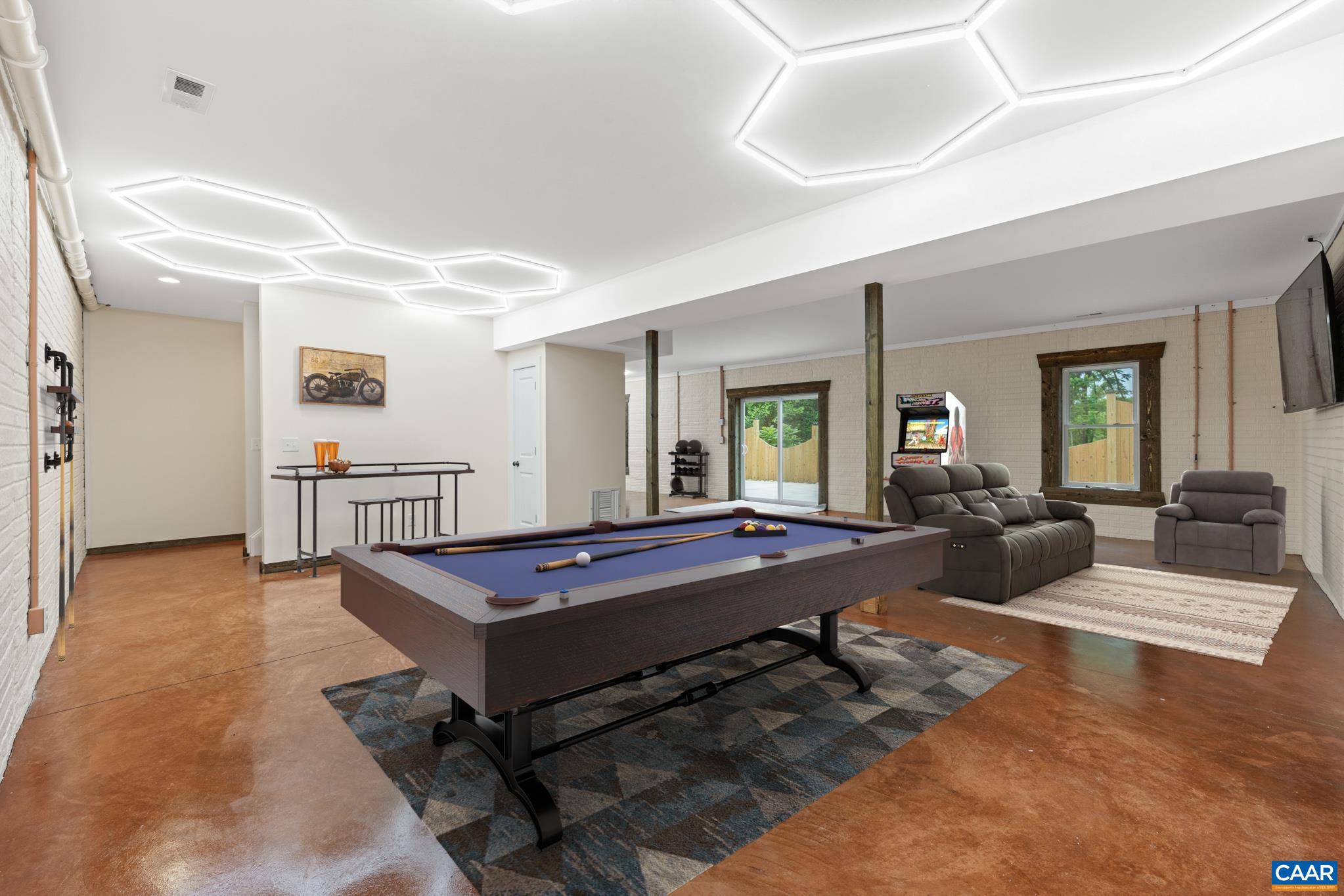 Finished basement offers a versatile space perfect for a media room, man cave or entertaining guests. With ample room for comfortable seating, a large screen or game room. Designed to be the ultimate retreat. Natural light filters in thru large windows.