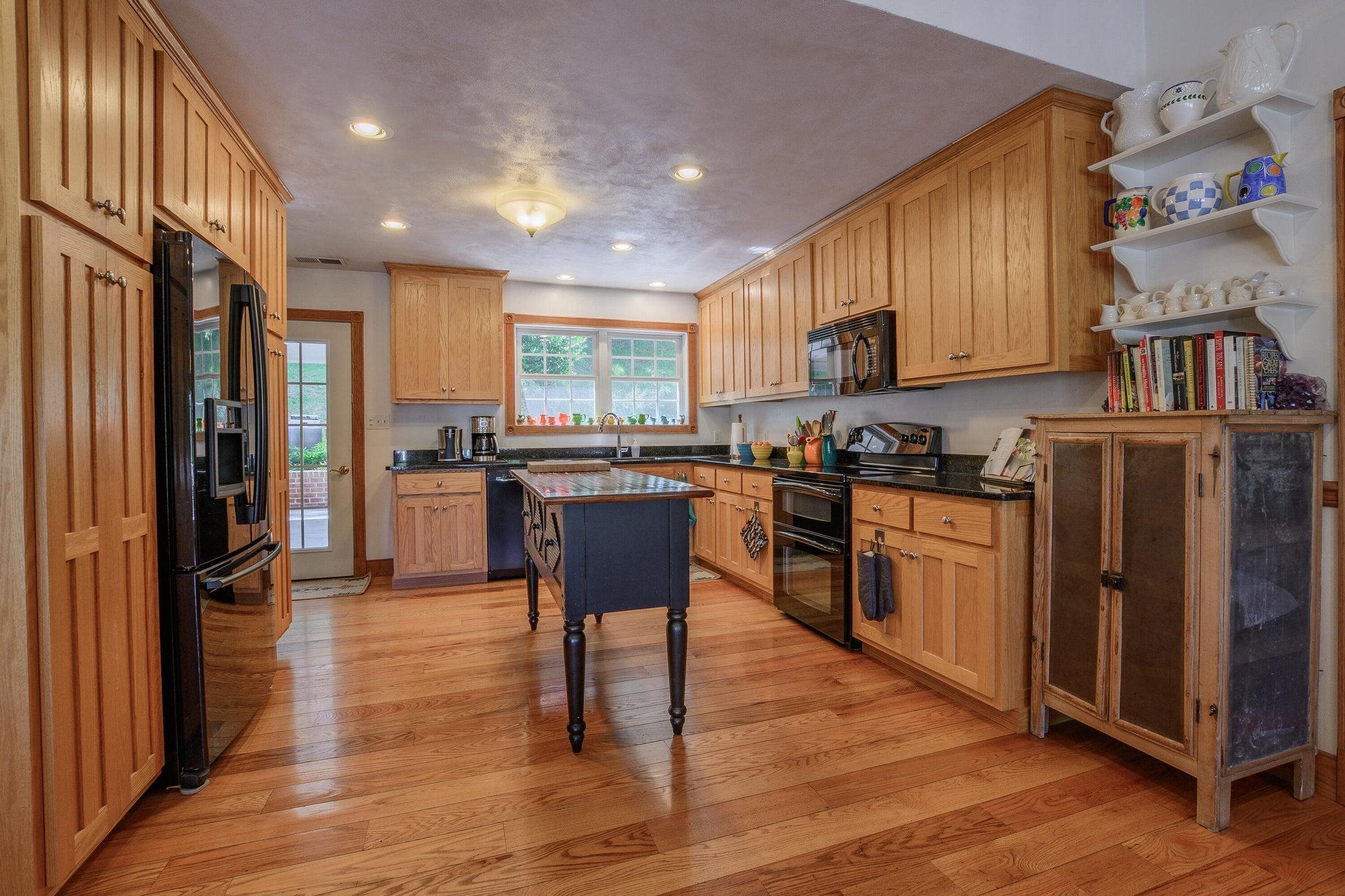 Beautiful wood floors throughout. Electric stove top.