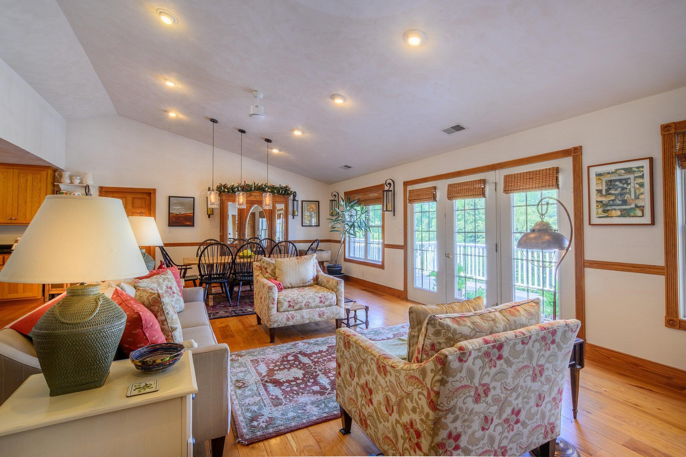 Dining area and Living room, with door to the Balcony.