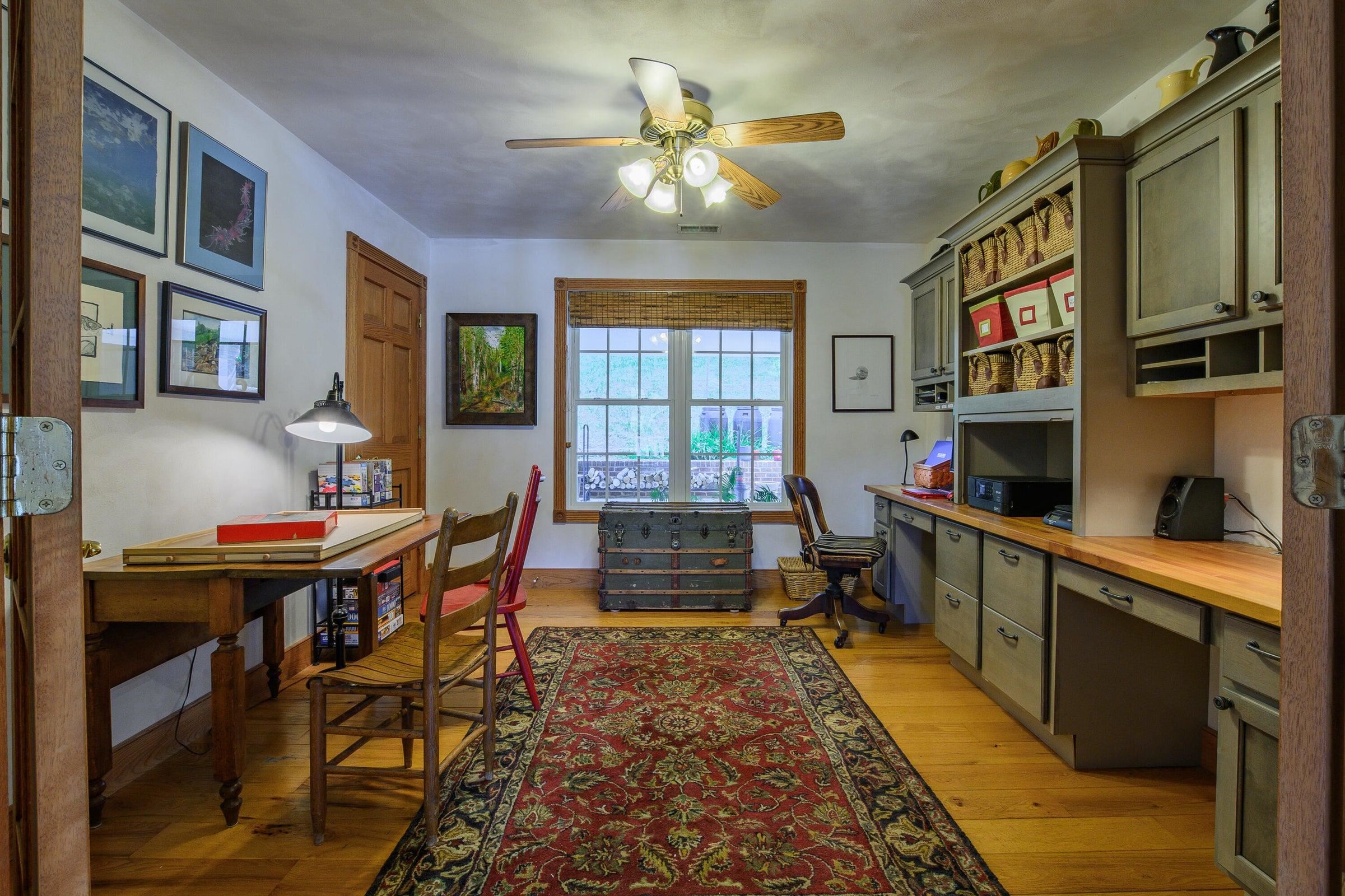 Off the back wall of the Living Room is a double door leading to a spacious office. Could be a bedroom, or whatever is required by a new owner.