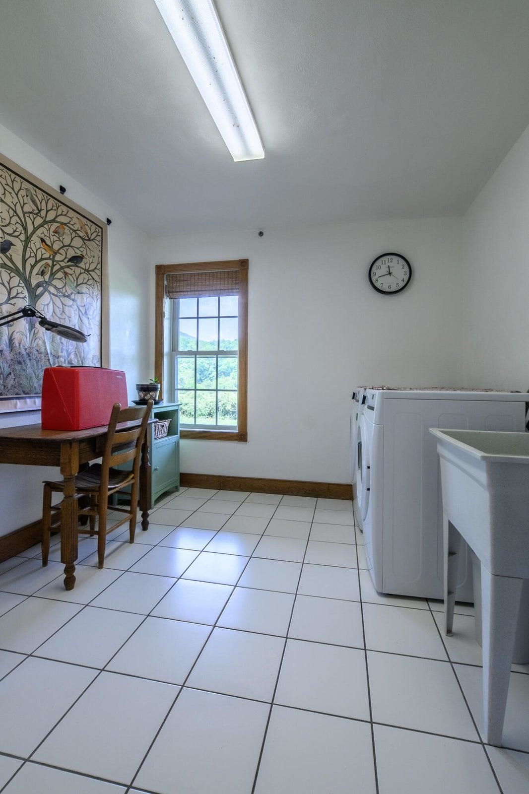Laundry room is spacious.