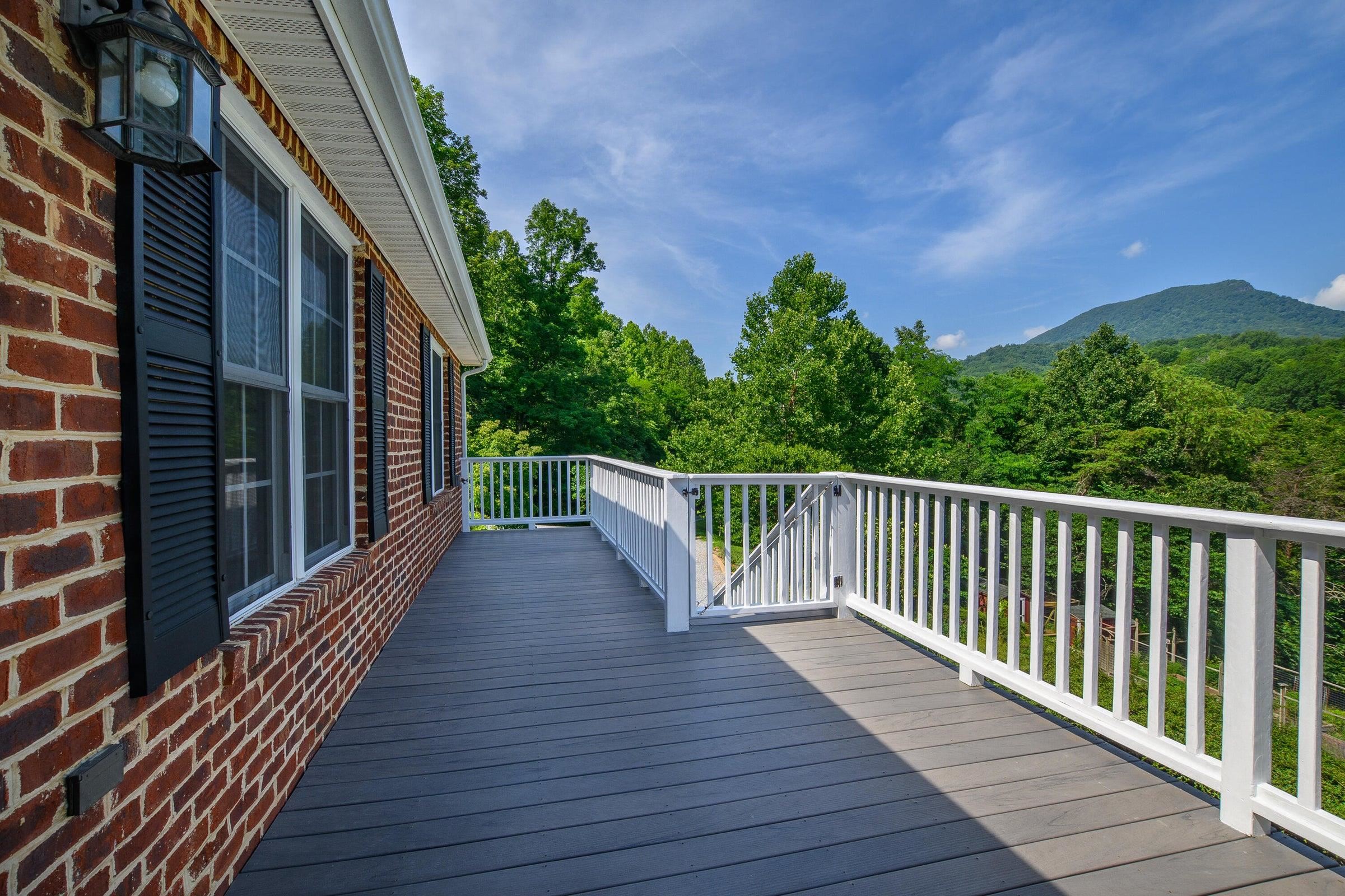 Additional deck and stairs to ground level were recently added. House Mountain in the background.