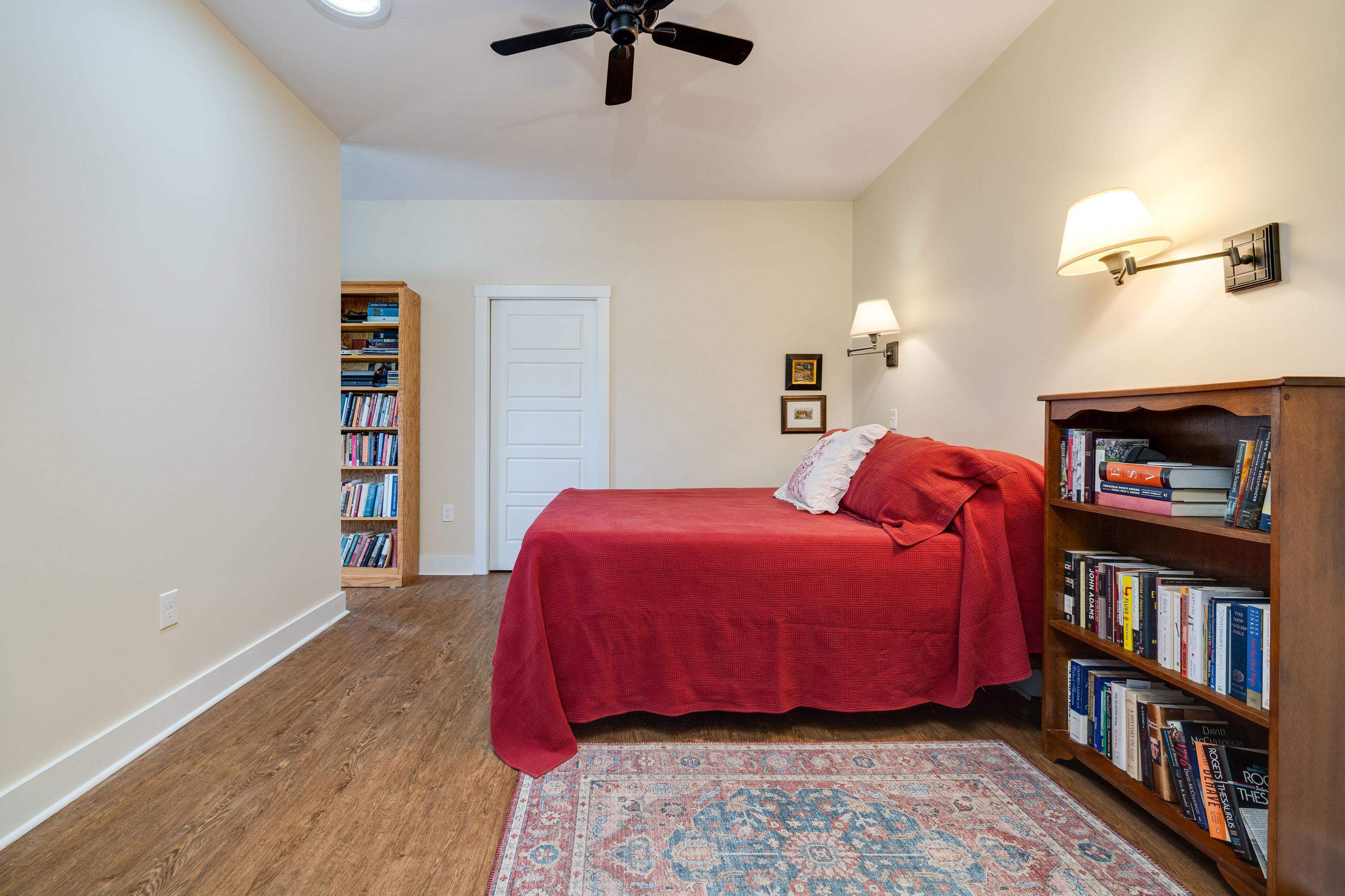 The primary bedroom offers space for a sitting area, walk-in closet, attached full bathroom, large windows, and much more!