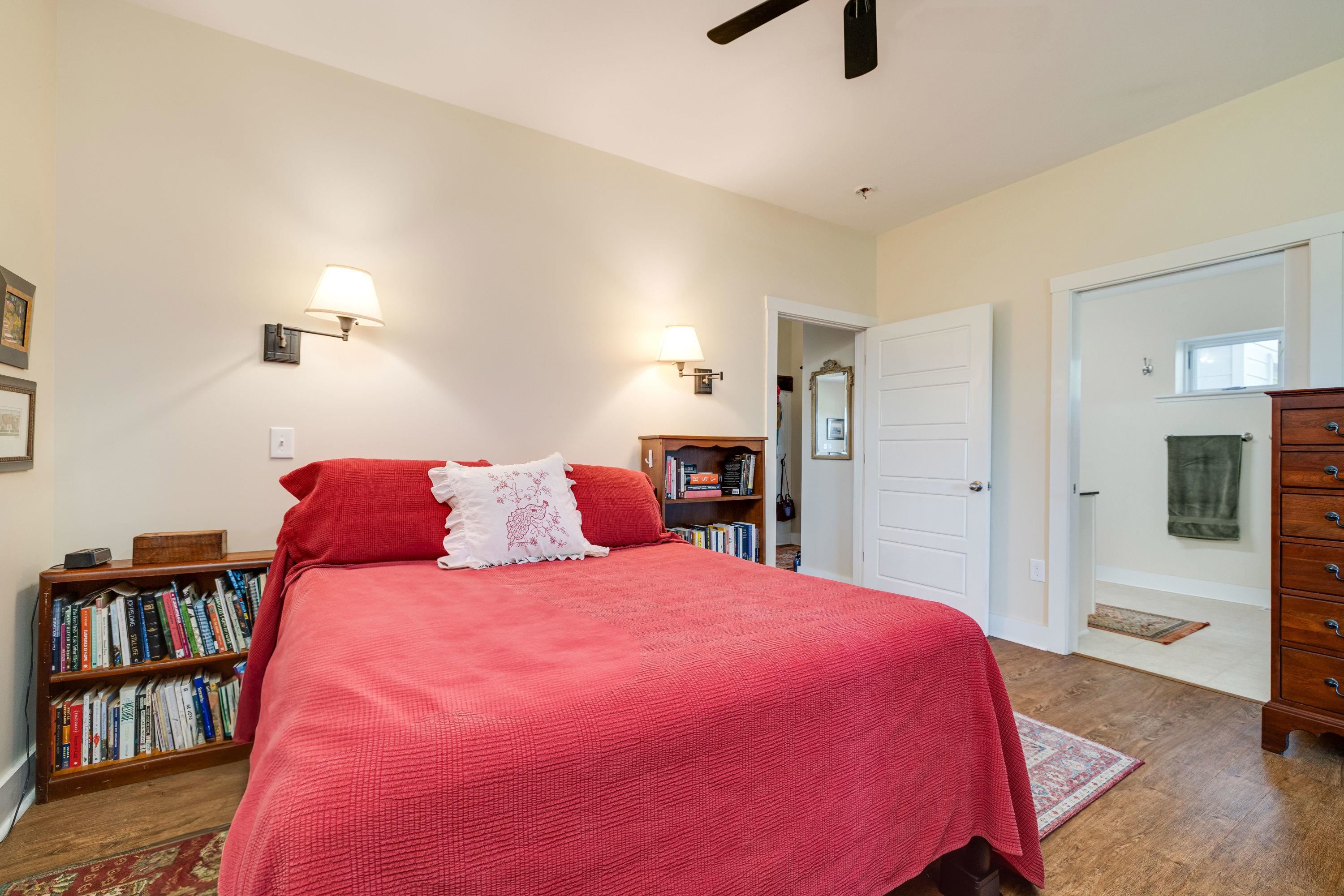 The primary bedroom offers space for a sitting area, walk-in closet, attached full bathroom, large windows, and much more!