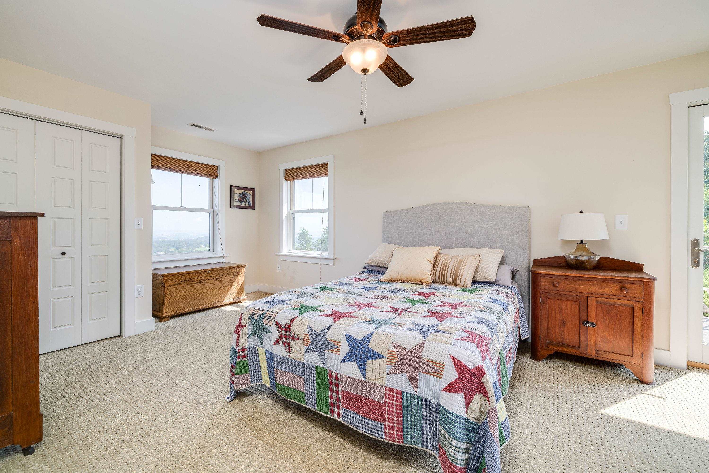 This third bedroom is on the upper level of the home and features comfortable flooring throughout, ceiling fan, large closet, and much more!