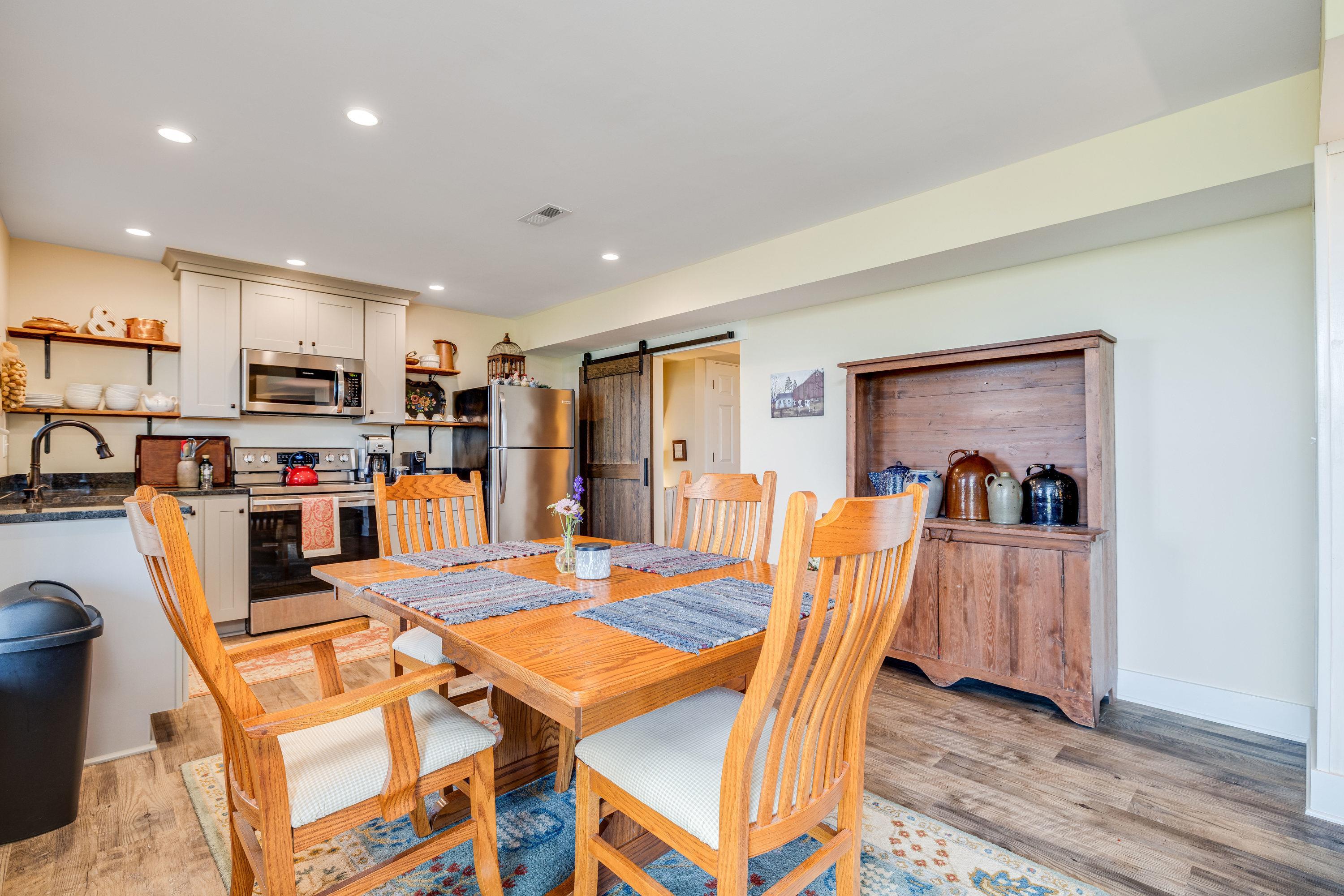 The dining area is located off the kitchen space and features plenty of room for a table and chairs set!