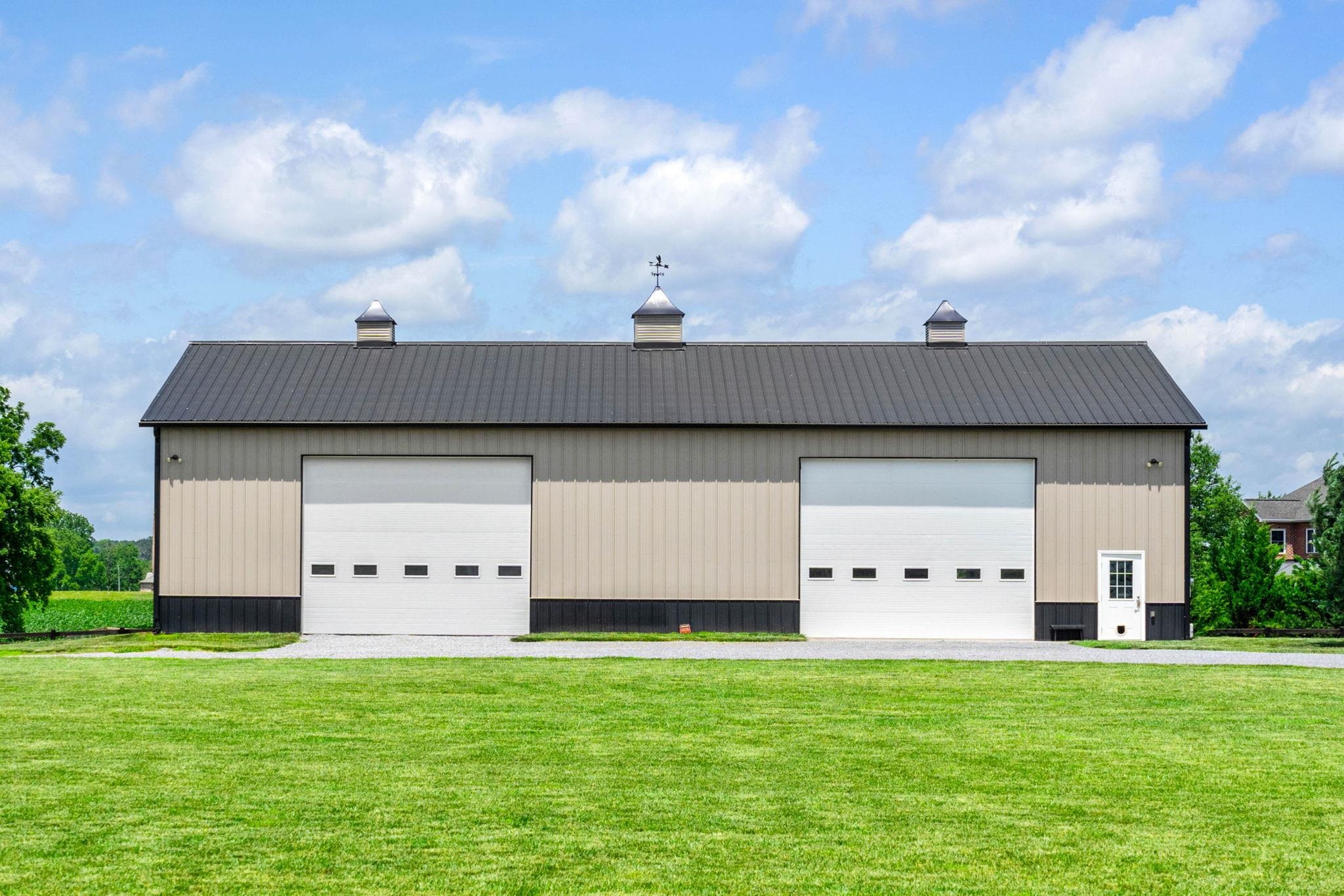 Half of the building has heated concrete flooring and is finished for storing vehicles and conditioned workshop area.  The other half is currently used for hay and equipment storage.