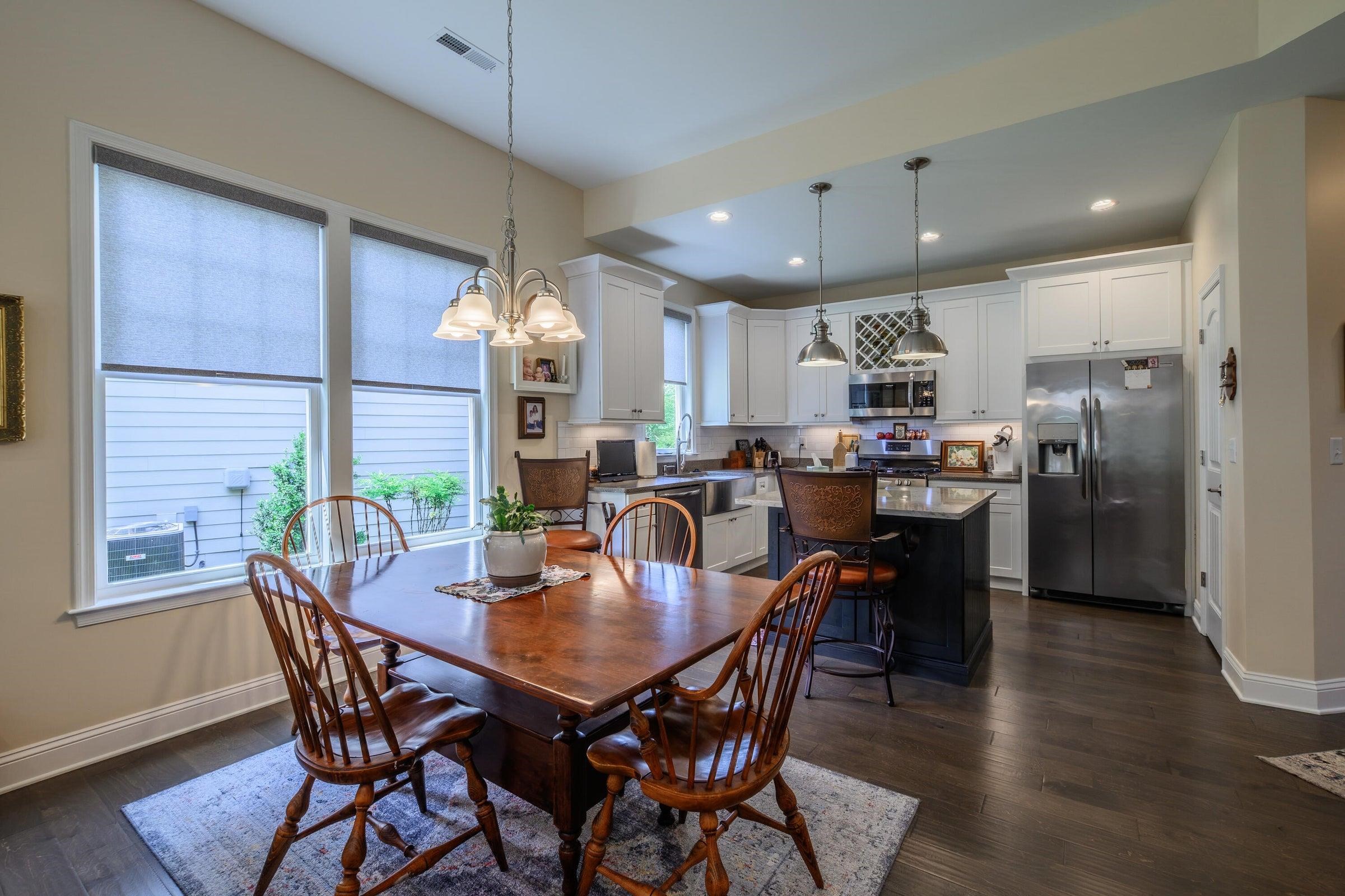 Kitchen opens to the dining area.