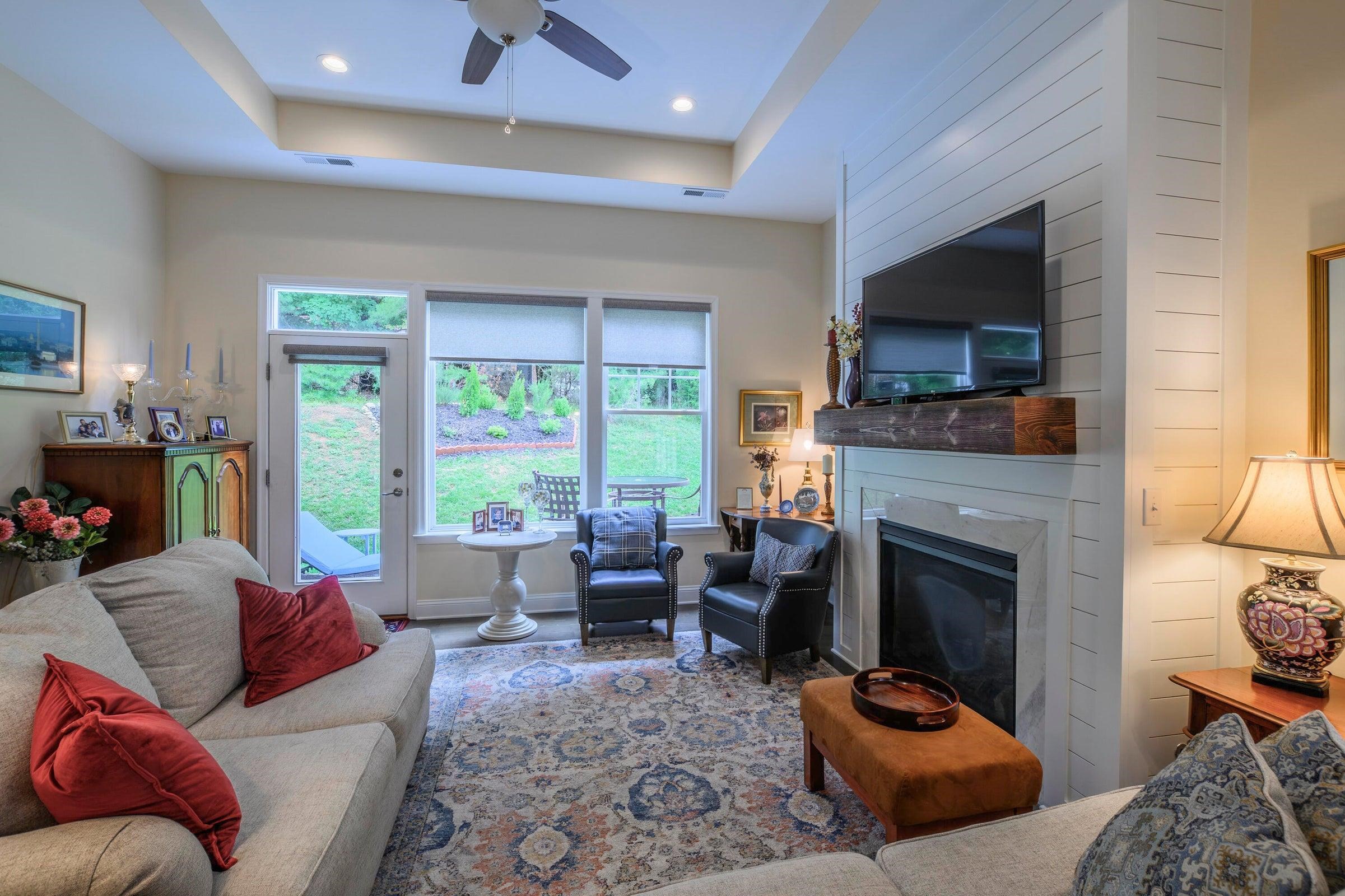Rear door and windows lead to the private back yard.