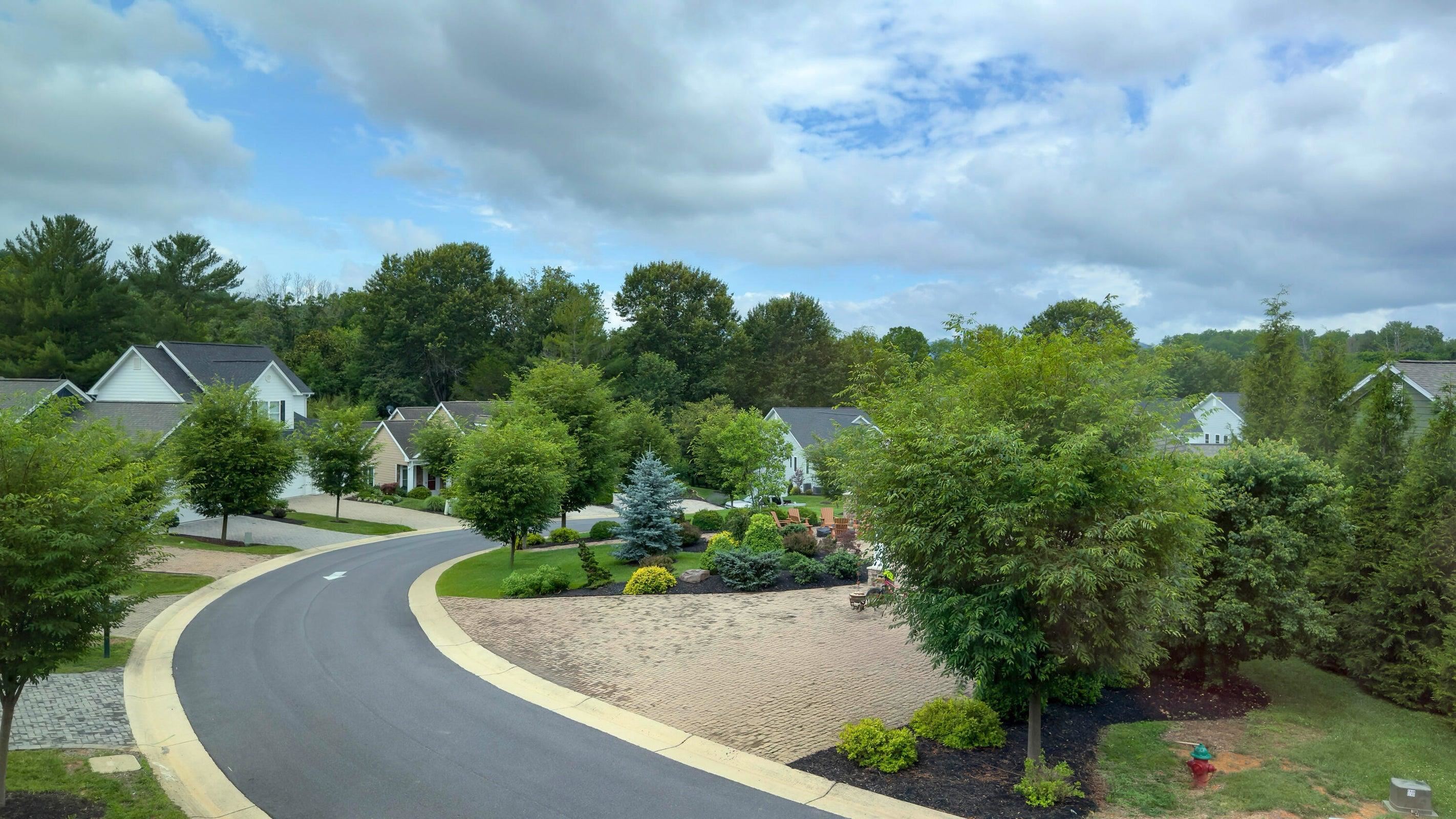 View from 2nd Floor. Enjoy beautiful sunsets from community pavilion across the street as you warm yourself up by gas fire pit.