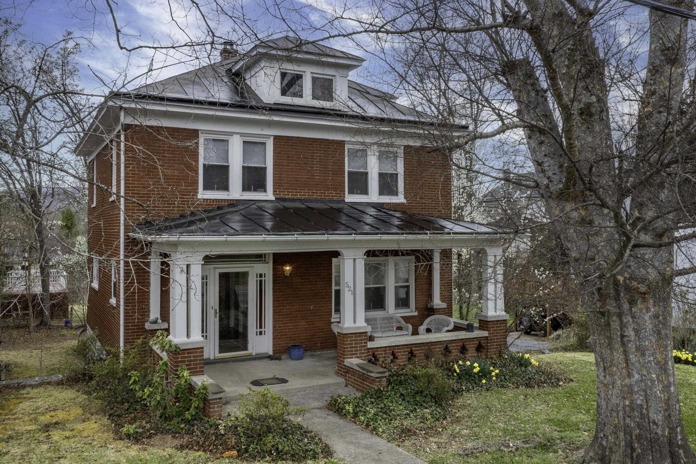 Enjoy the picturesque Main Street setting from your covered front porch.