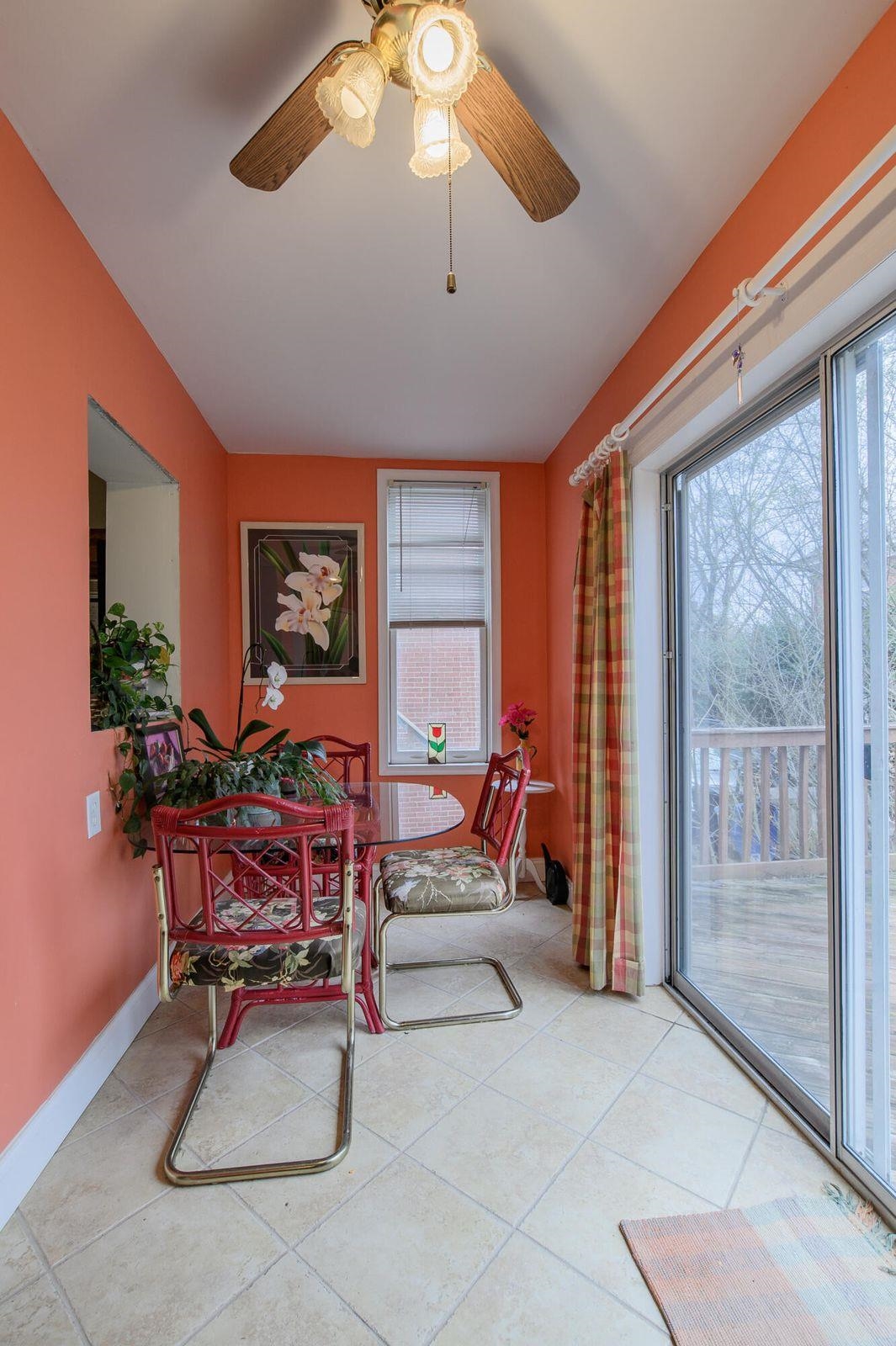 Enjoy watching the birds or sipping coffee from your sunroom addition with half bath.