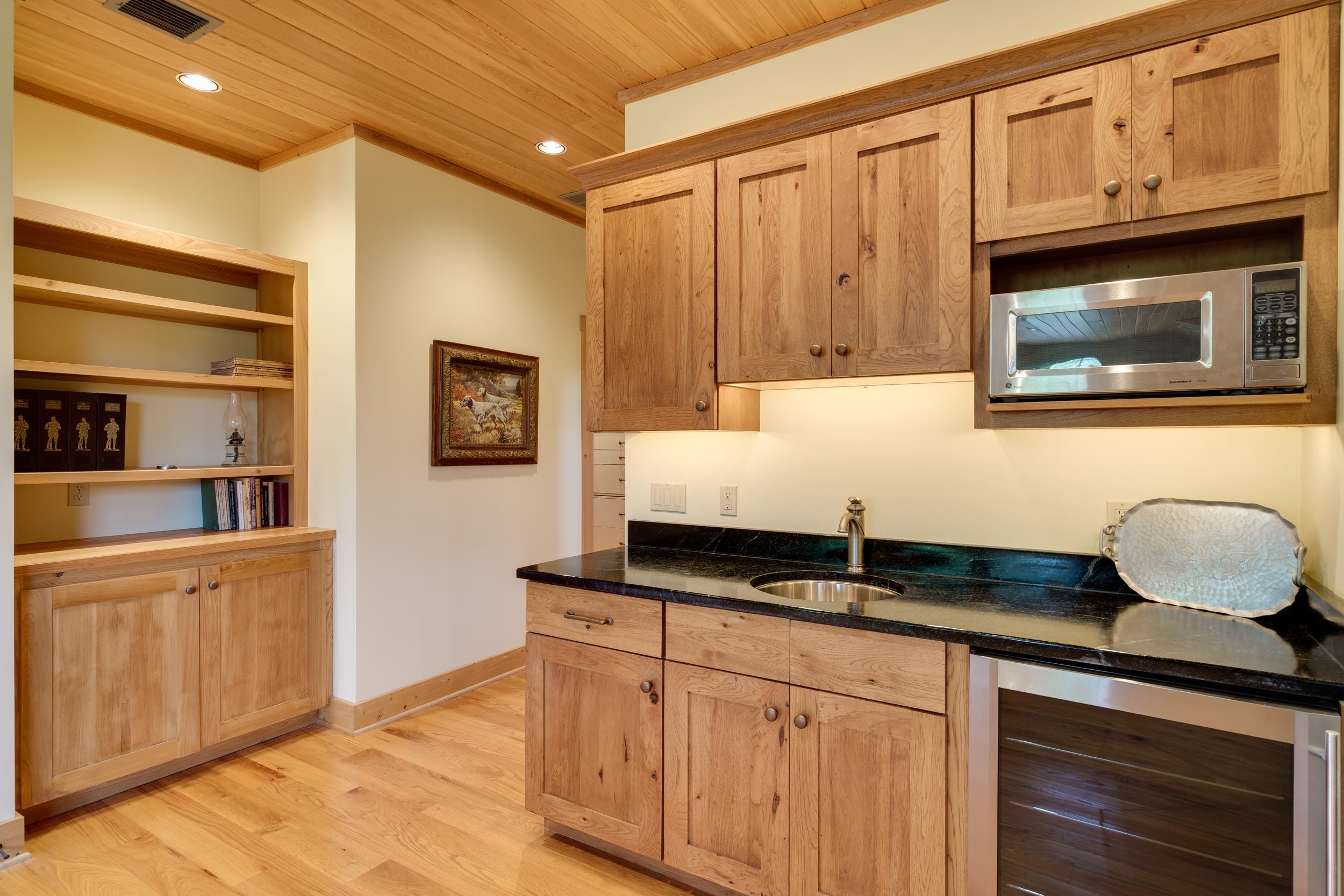 This room that is used as entertainment, can actually be a 2nd Level Primary Suite, has a closet