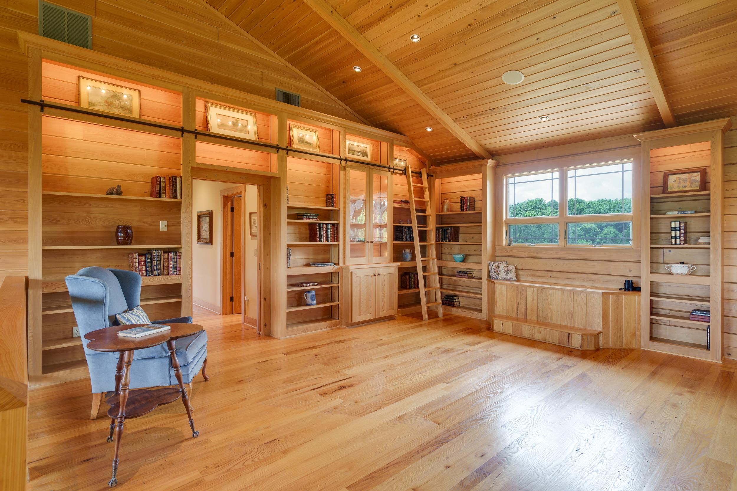 Storage in window seat, lights on shelves.
