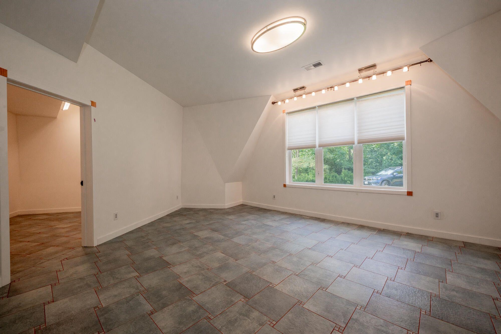 First floor Primary Suite with walk-in closet.