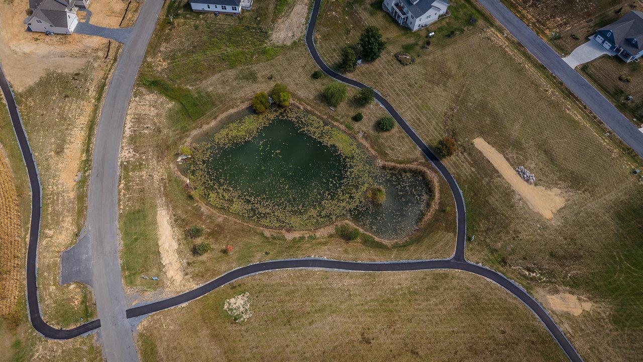 Newly asphalted walking trails meander throughout the neighborhood.