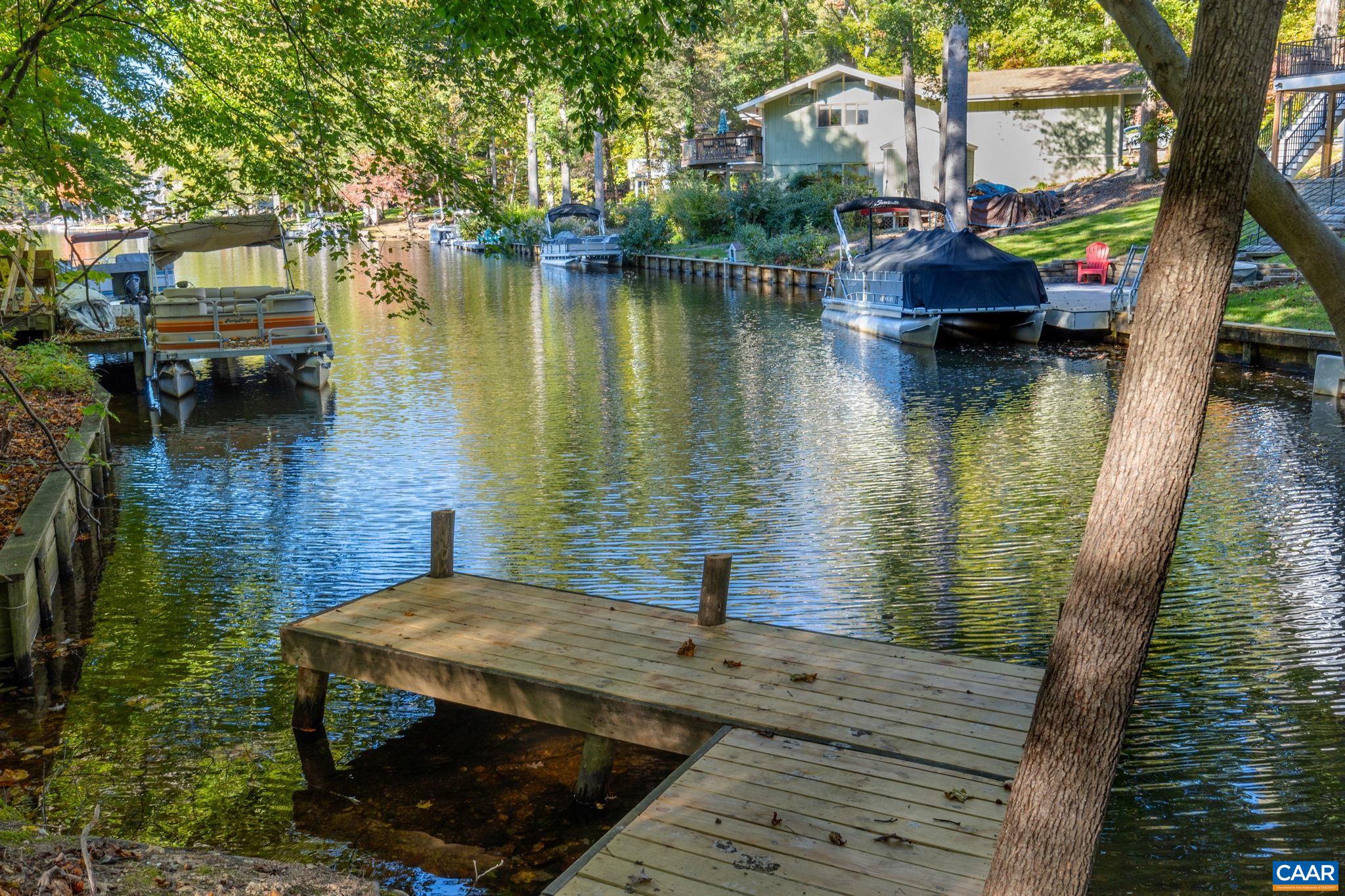 Lowest Priced Lakefront home in Lake Monticello with Private Dock and over $100k in upgrades.