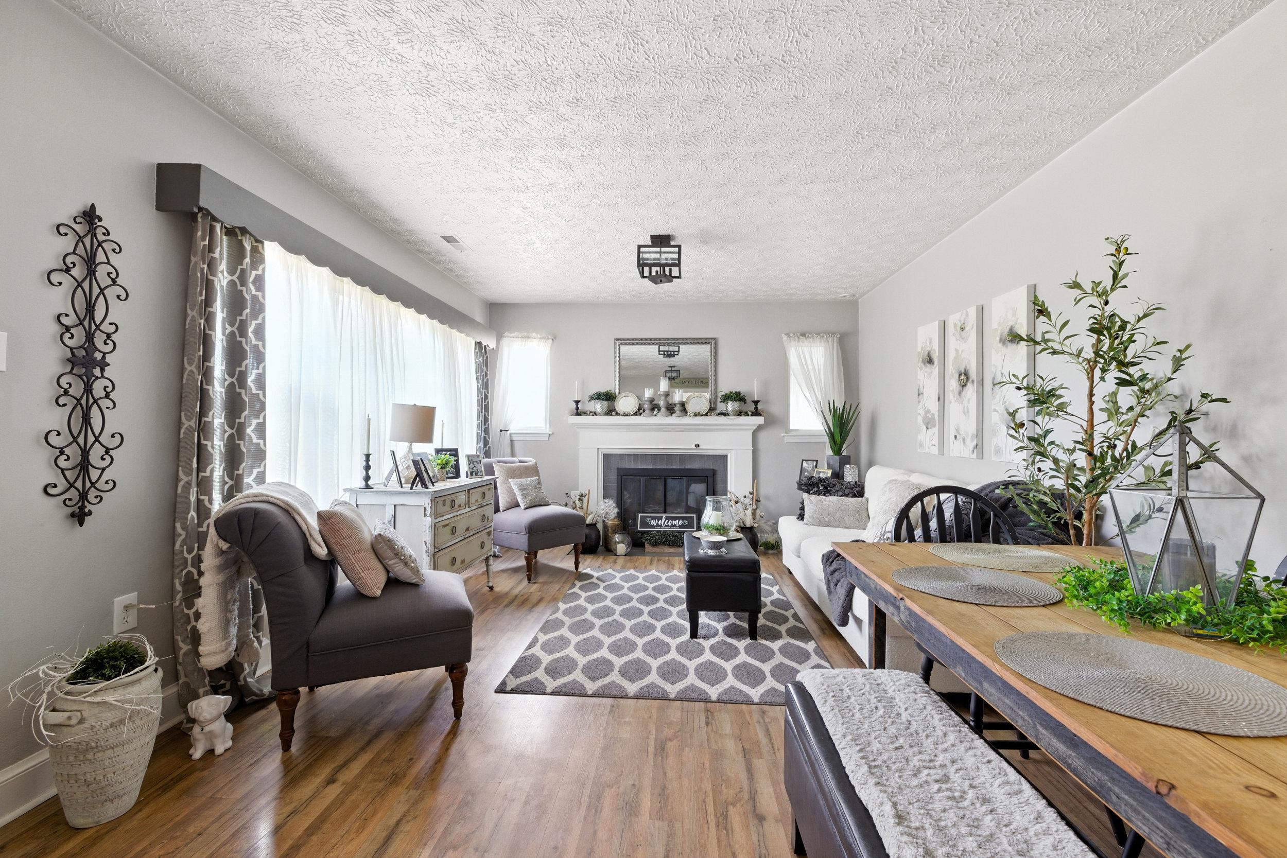 A gas log fireplace anchors the living room.