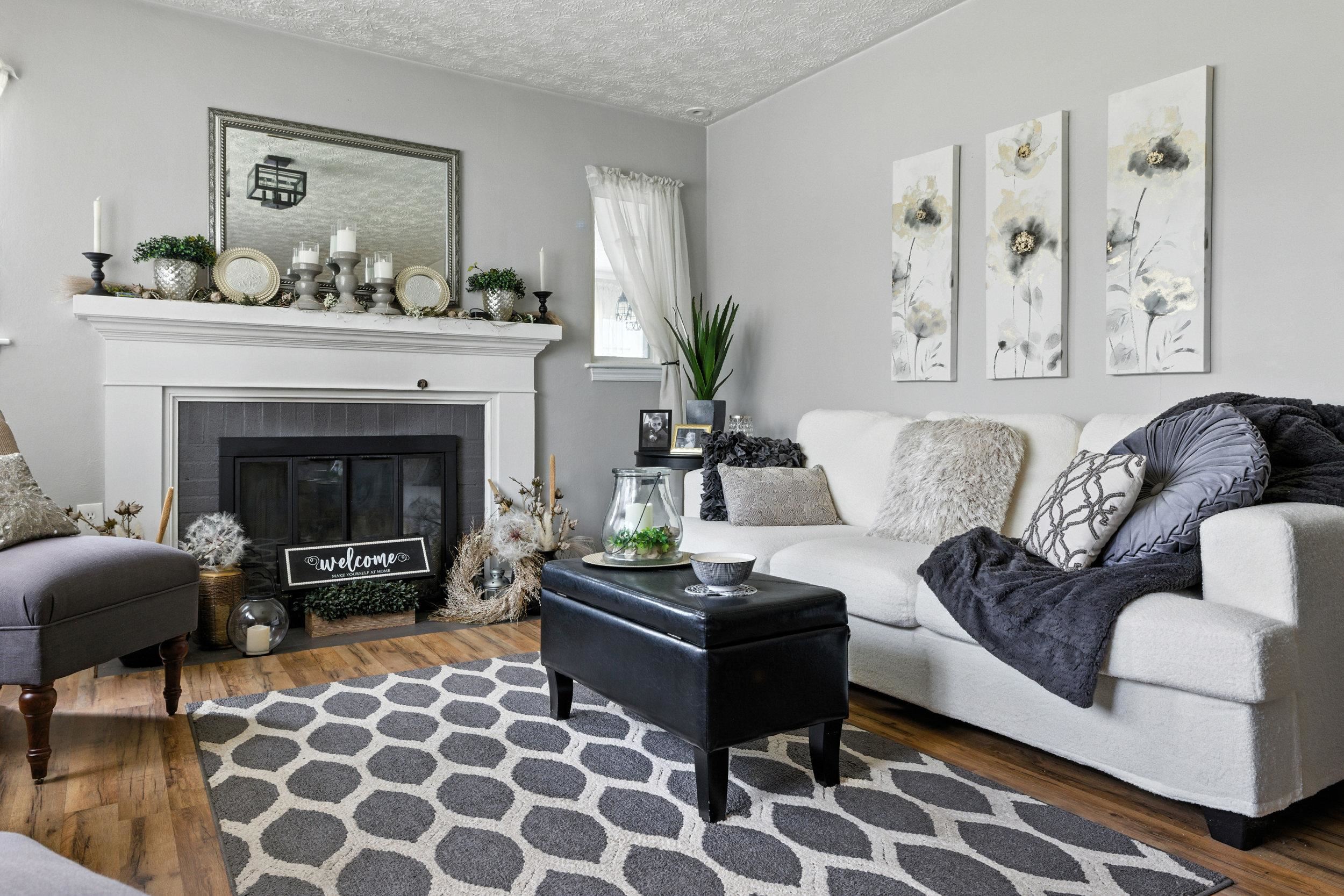 A classic fireplace with its mantel adds ambience!