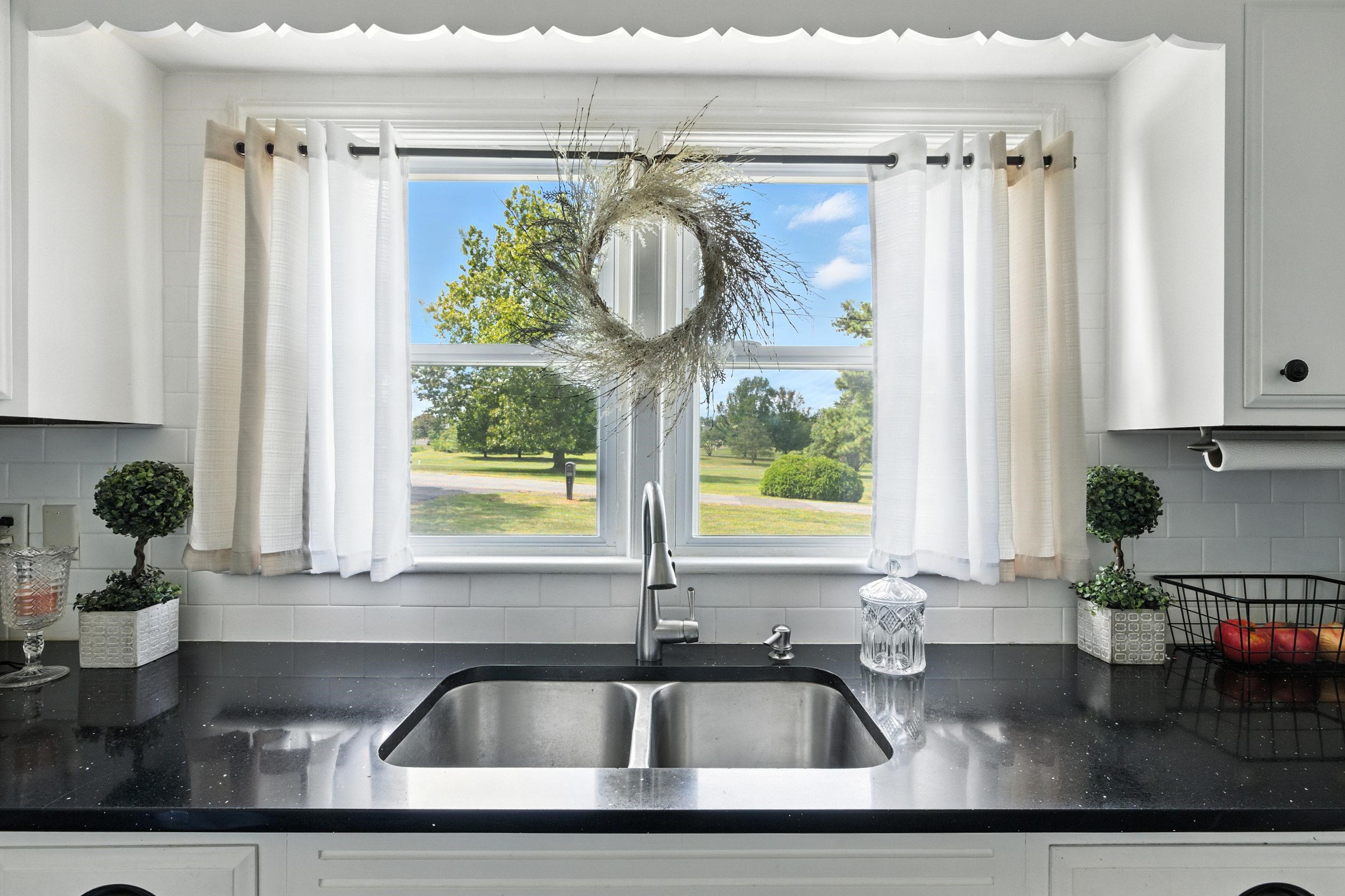 Double stainless steel sink with a fairway view!