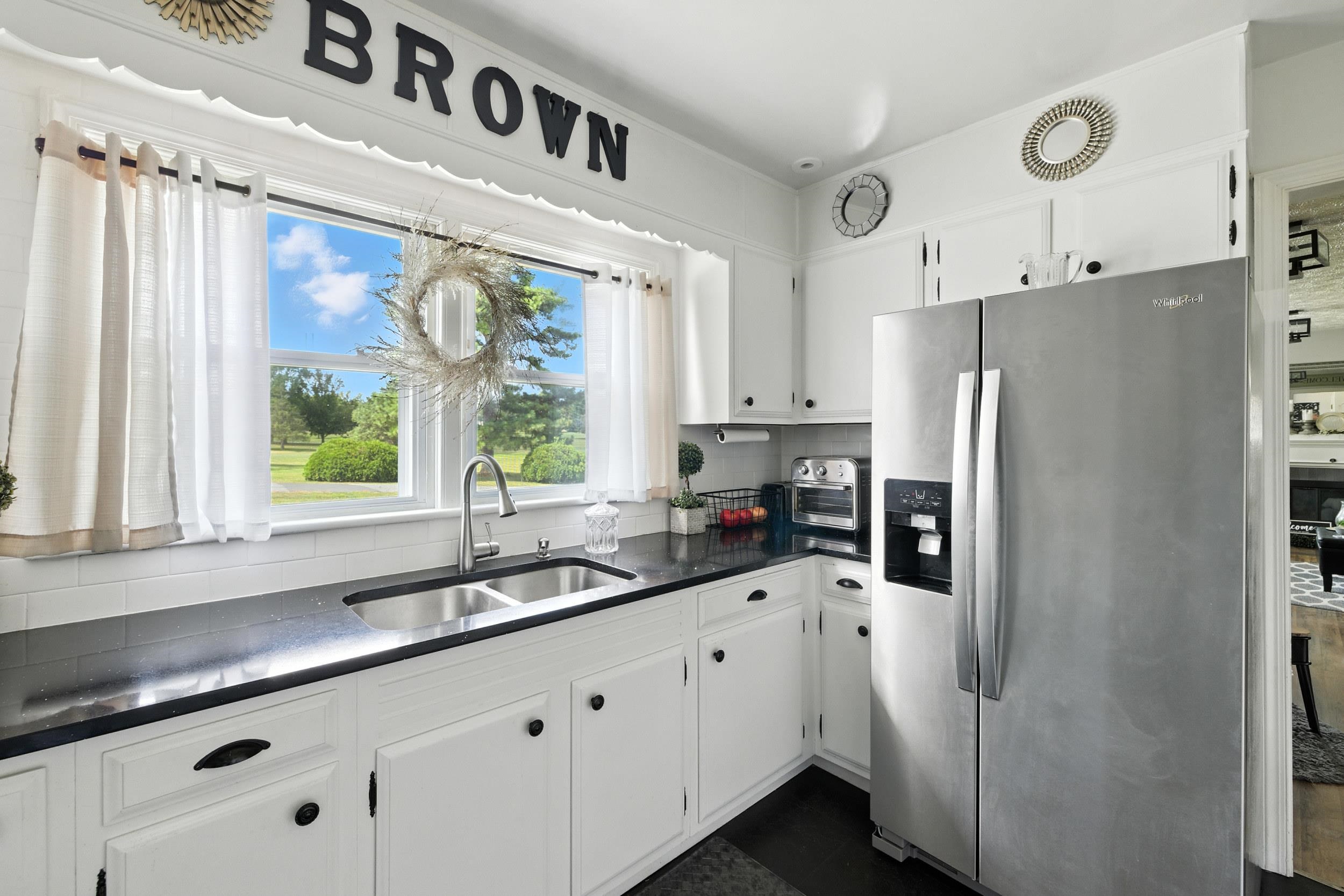 Whirlpool refrigerator with ice/water in the door.