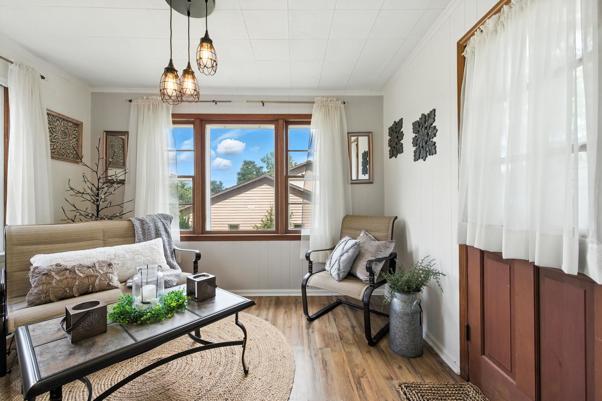 Sunroom has a large picture window.