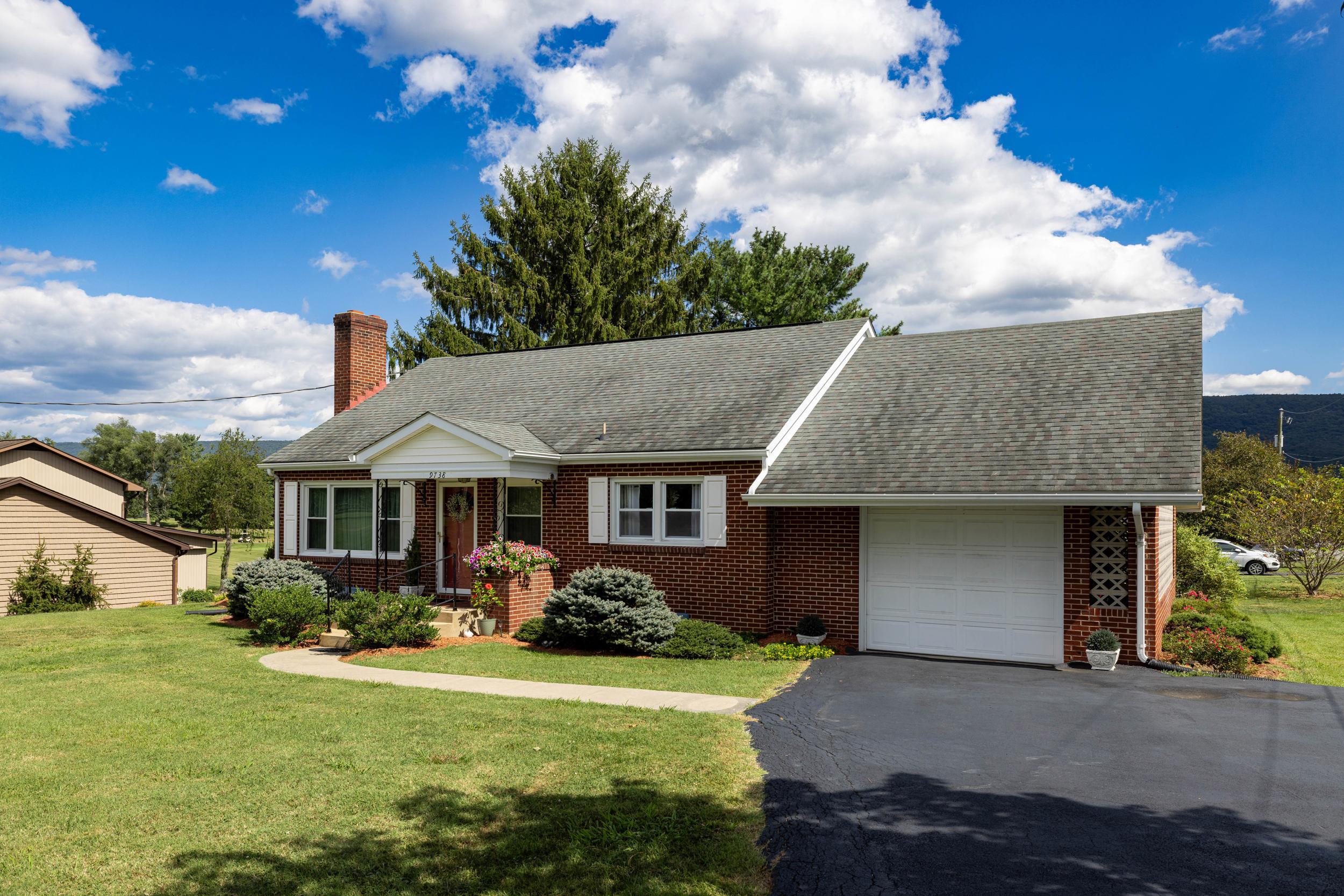 Can park several cars in the paved driveway.