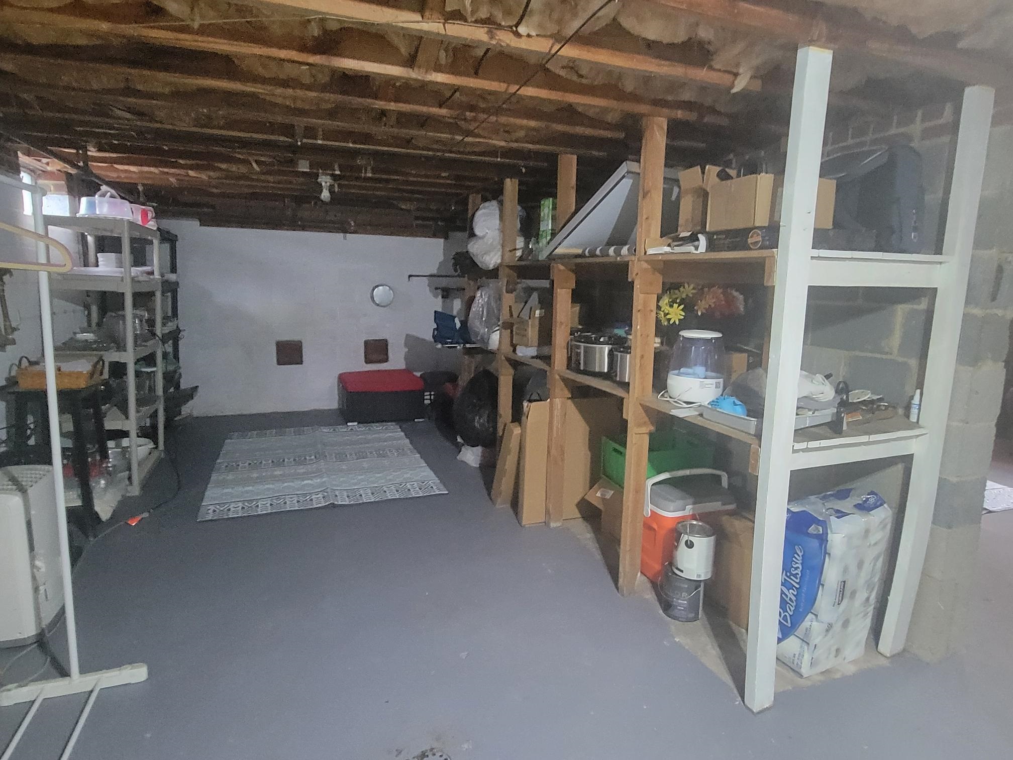 Lots of shelving in this section of the basement.