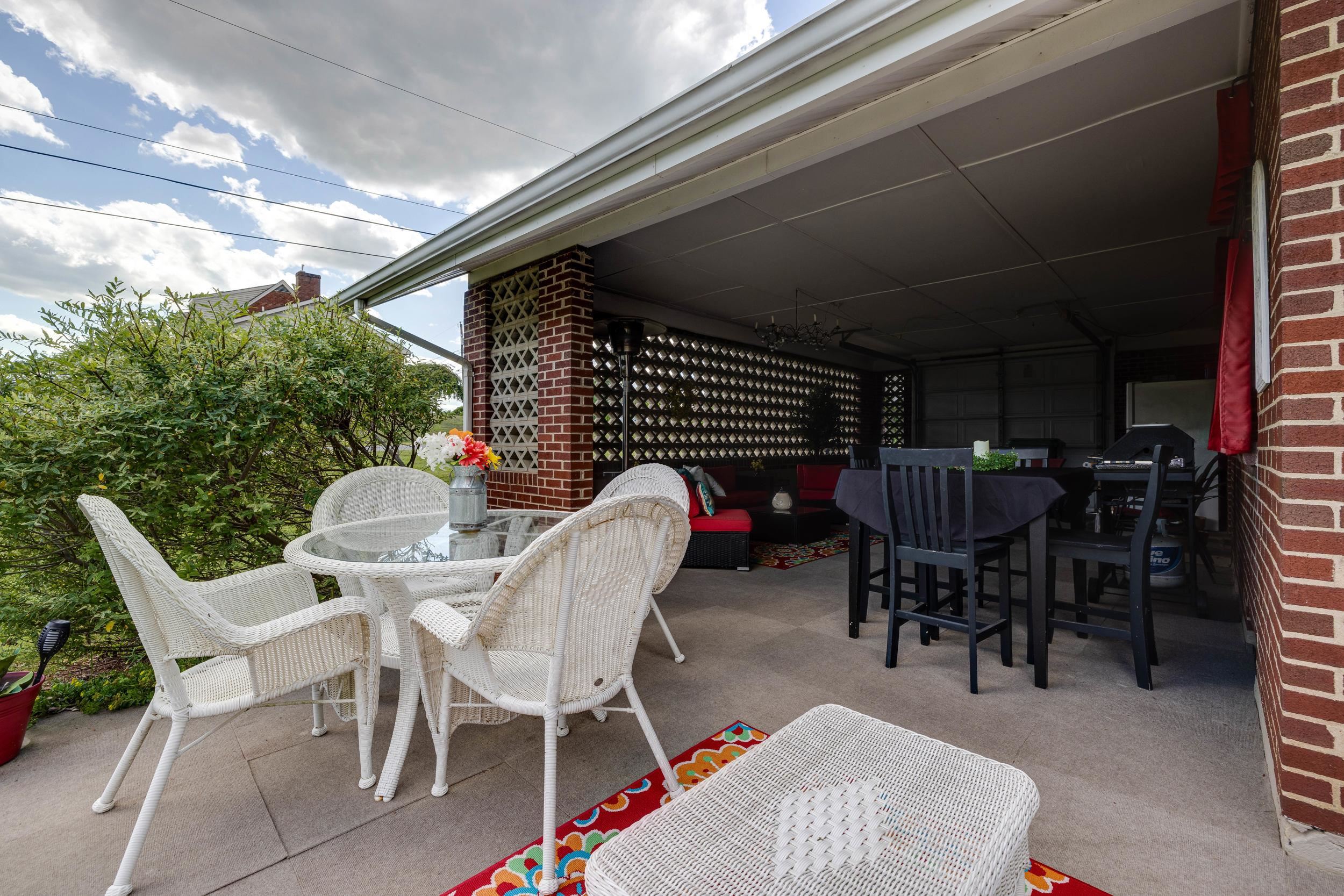 Carport & patio both have indoor/outdoor carpet.