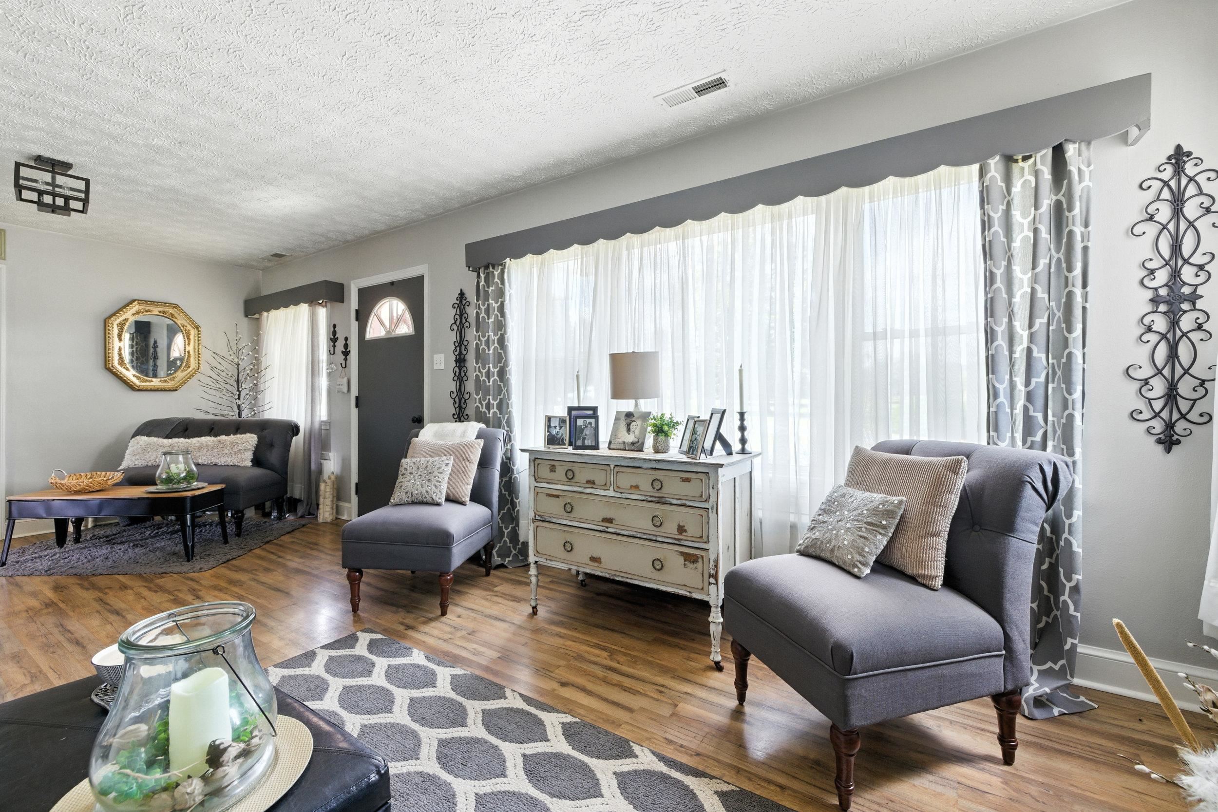 Light filled Living room with large picture window.