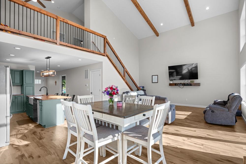 off kitchen with cathderal ceiling