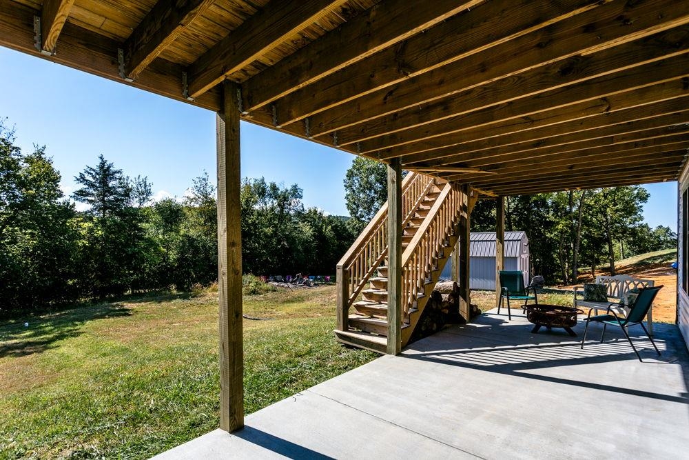 with fire pit and basement entrance.